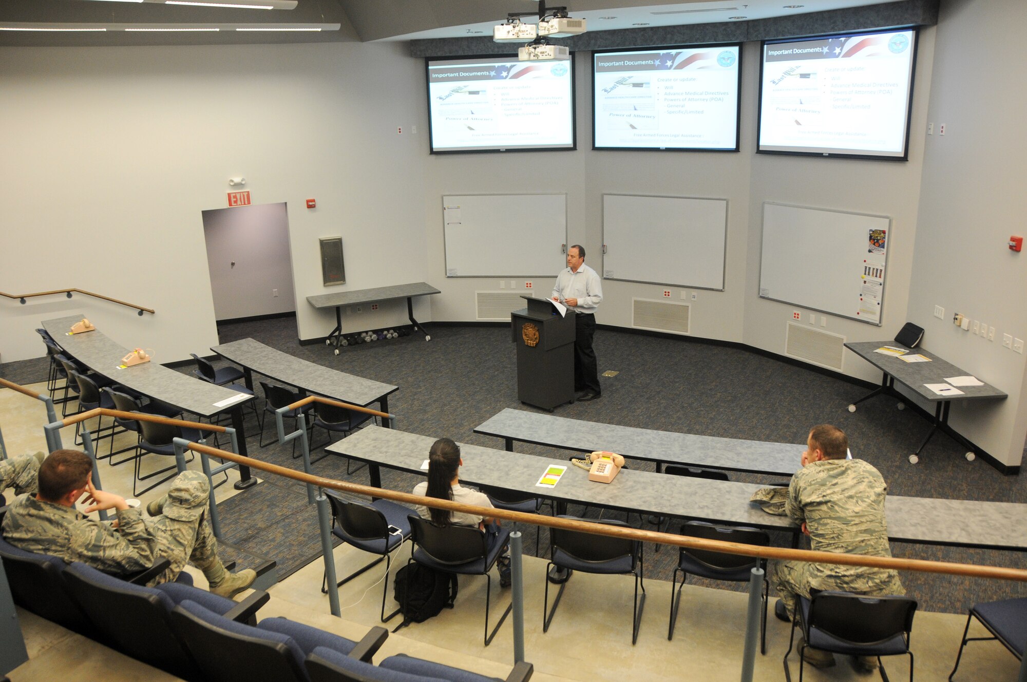 Don Rodgers, personal financial counselor and certified financial planner, speaks June 4, 2015 to Airmen of the 188th Wing at Ebbing Air National Guard Base, Fort Smith, Ark., about managing credit and debt, financial planning for deployment and the thrift savings plan. Rodgers visit was planned in conjunction with the 188th Airman and Family Readiness Program to highlight the financial planning services available to military members. (U.S. Air National Guard photo by Senior Airman Cody Martin/Released)