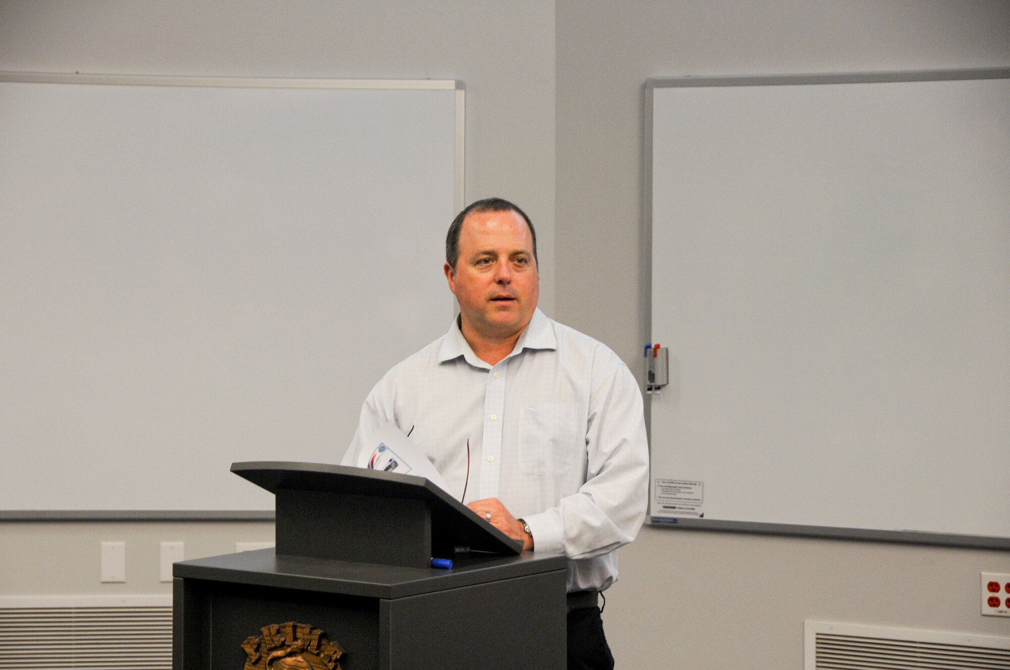 Don Rodgers, personal financial counselor and certified financial planner, speaks June 4, 2015 to Airmen of the 188th Wing at Ebbing Air National Guard Base, Fort Smith, Ark., about managing credit and debt, financial planning for deployment and the thrift savings plan. Rodgers visit was planned in conjunction with the 188th Airman and Family Readiness Program to highlight the financial planning services available to military members. (U.S. Air National Guard photo by Senior Airman Cody Martin/Released)
