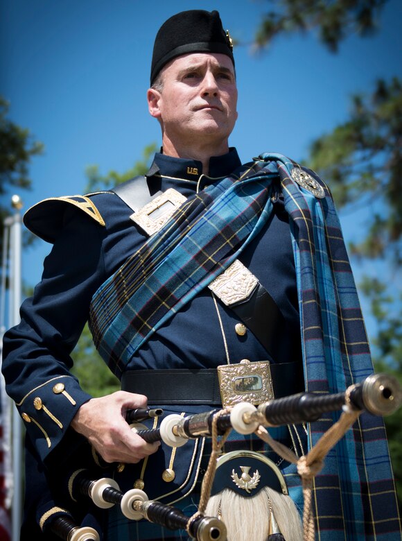 Senior Master Sgt. Steven Bicknell, 919th Maintenance Squadron, plays the bagpipes for the Army’s 7th Special Forces Group memorial service for 21 fallen comrades May 21 at Eglin Air Force Base, Fla.  (U.S. Air Force photo/Tech. Sgt. Jasmin Taylor)