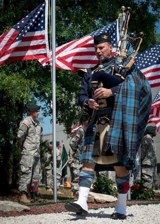 Senior Master Sgt. Steven Bicknell, 919th Maintenance Squadron, plays the bagpipes for the Army’s 7th Special Forces Group memorial service for 21 fallen comrades May 21 at Eglin Air Force Base, Fla.  (U.S. Air Force photo/Tech. Sgt. Jasmin Taylor)