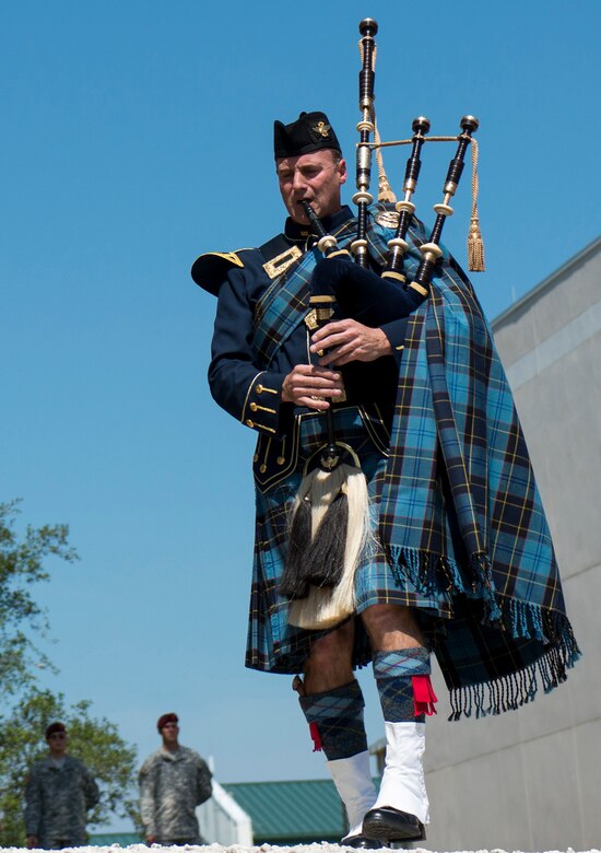 Senior Master Sgt. Steven Bicknell, 919th Maintenance Squadron, plays the bagpipes for the Army’s 7th Special Forces Group memorial service for 21 fallen comrades May 21 at Eglin Air Force Base, Fla.  (U.S. Air Force photo/Tech. Sgt. Jasmin Taylor)
