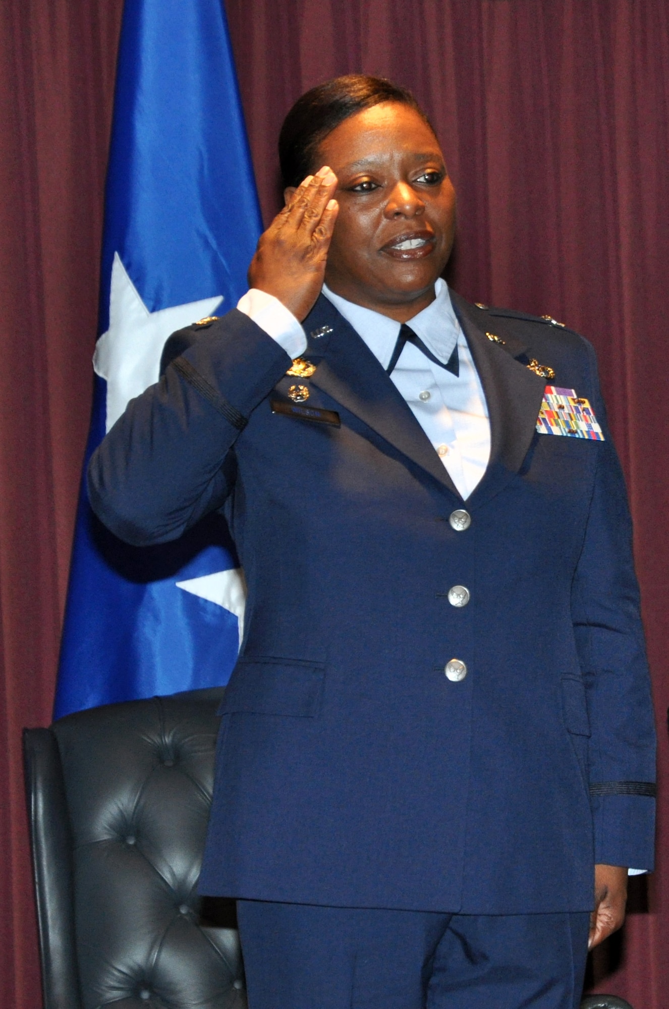 Col. Stephanie Wilson renders her first salute as commander of the 72nd Air Base Wing May 27. (Air Force photo by Brion Ockenfels/Released)