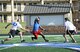 Med Group’s Tre Williams tries to weave past Reserve White’s Patrick Ridlon and Larry Mansell during the Spring Flag Football league’s championship game on May 21. Med Group won their third consecutive spring championship, shutting out Reserve White, 20-0. “We had a bitter taste in our mouth after losing 24-0, so we made it our mission to win,” said Med Group coach Zhamar McAdory. (Air Force photo by Kelly White/Released)