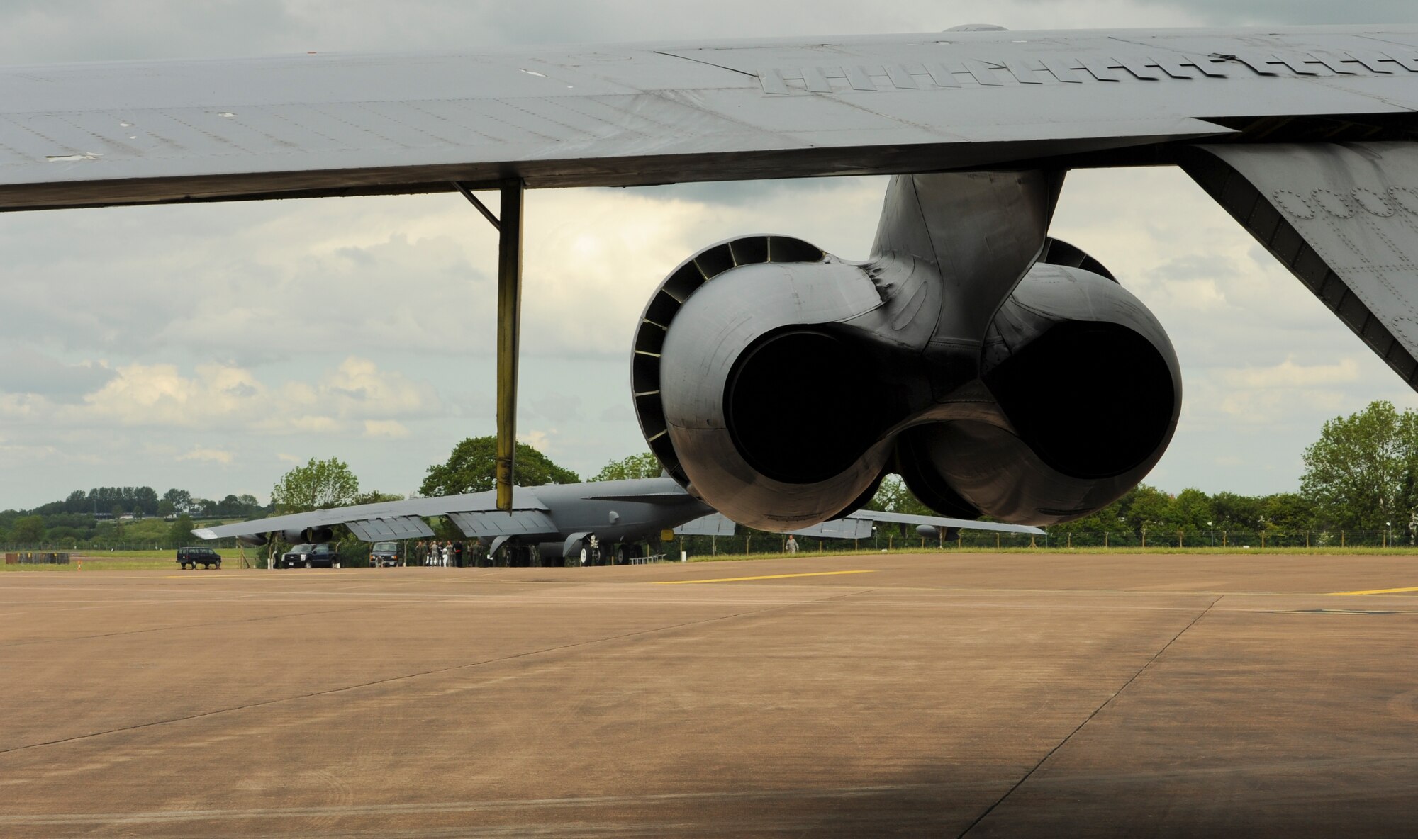 Two B-52H Stratofortresses from Minot Air Force Base, N.D., sit on the flightline after landing at Royal Air Force Fairford, England, June 5, 2015. In total, three B-52s and over 300 air crews,  maintenance crews and support teams from bases across Air Force Global Strike Command forward deployed to RAF Fairford to participate in multi-national BALTOPS and Sabre Strike exercises. The purpose of BALTOPS 15 is to promote mutual understanding, confidence, cooperation and inoperability among forces and personnel of participating nation. Sabre Strike is a long-standing U.S. Army Europe-led cooperative training exercise conducted annually, which aims to improve cooperation and capabilities of participating nations for future contingency operations and train participants on command and control as well as interoperability with regional partners. (U.S. Air Force photo by Capt. Christopher Mesnard)