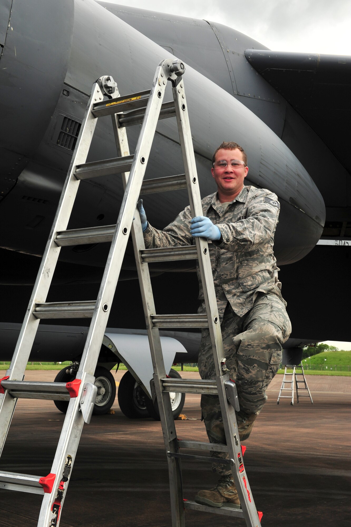 Staff Sgt. Eric Andreasens, 5th Aircraft Maintenance Squadron dedicated crew chief, climbs down a ladder after inspecting the engines of a B-52H Stratofortress from Minot Air Force Base, N.D., at Royal Air Force Fairford, England, June 5, 2015. Three B-52s, maintenance crews and support teams from bases across Air Force Global Strike Command forward deployed to RAF Fairford to participate in multi-national BALTOPS and Saber Strike exercises. The purpose of BALTOPS 15 is to promote mutual understanding, confidence, cooperation and inoperability among forces and personnel of participating nation. Saber Strike is a long-standing U.S. Army Europe-led cooperative training exercise conducted annually, which aims to improve cooperation and capabilities of participating nations for future contingency operations and train participants on command and control as well as interoperability with regional partners. (U.S. Air Force photos/Senior Airman Malia Jenkins)