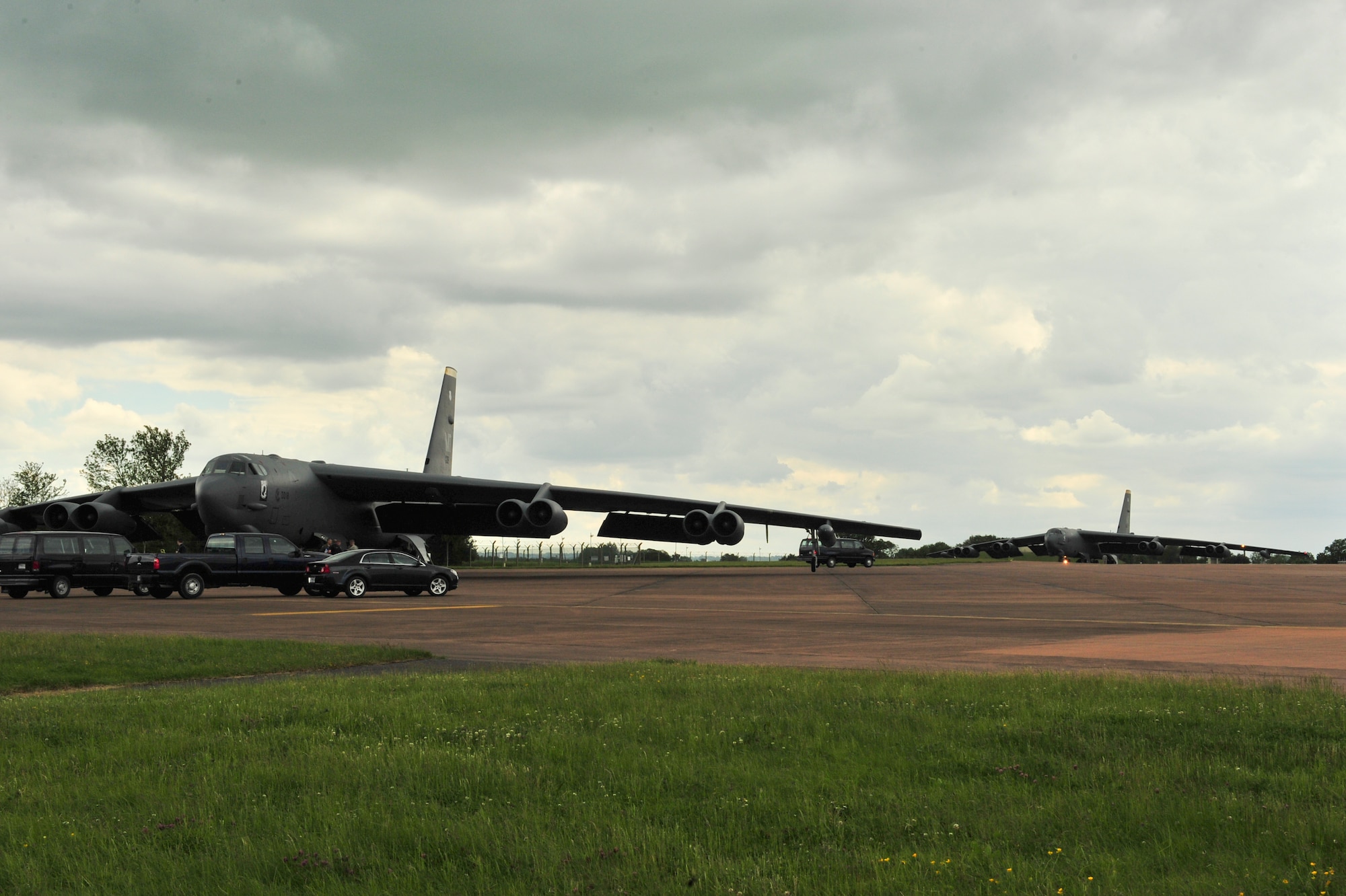 B-52H Stratofortresses from Minot Air Force Base, N.D., sit on the flightline after landing at Royal Air Force Fairford, England, June 5, 2015. Three B-52s, maintenance crews and support teams from bases across Air Force Global Strike Command forward deployed to RAF Fairford to participate in multi-national BALTOPS and Saber Strike exercises. The purpose of BALTOPS 15 is to promote mutual understanding, confidence, cooperation and inoperability among forces and personnel of participating nation. Saber Strike is a long-standing U.S. Army Europe-led cooperative training exercise conducted annually, which aims to improve cooperation and capabilities of participating nations for future contingency operations and train participants on command and control as well as interoperability with regional partners. (U.S. Air Force photos/Senior Airman Malia Jenkins)