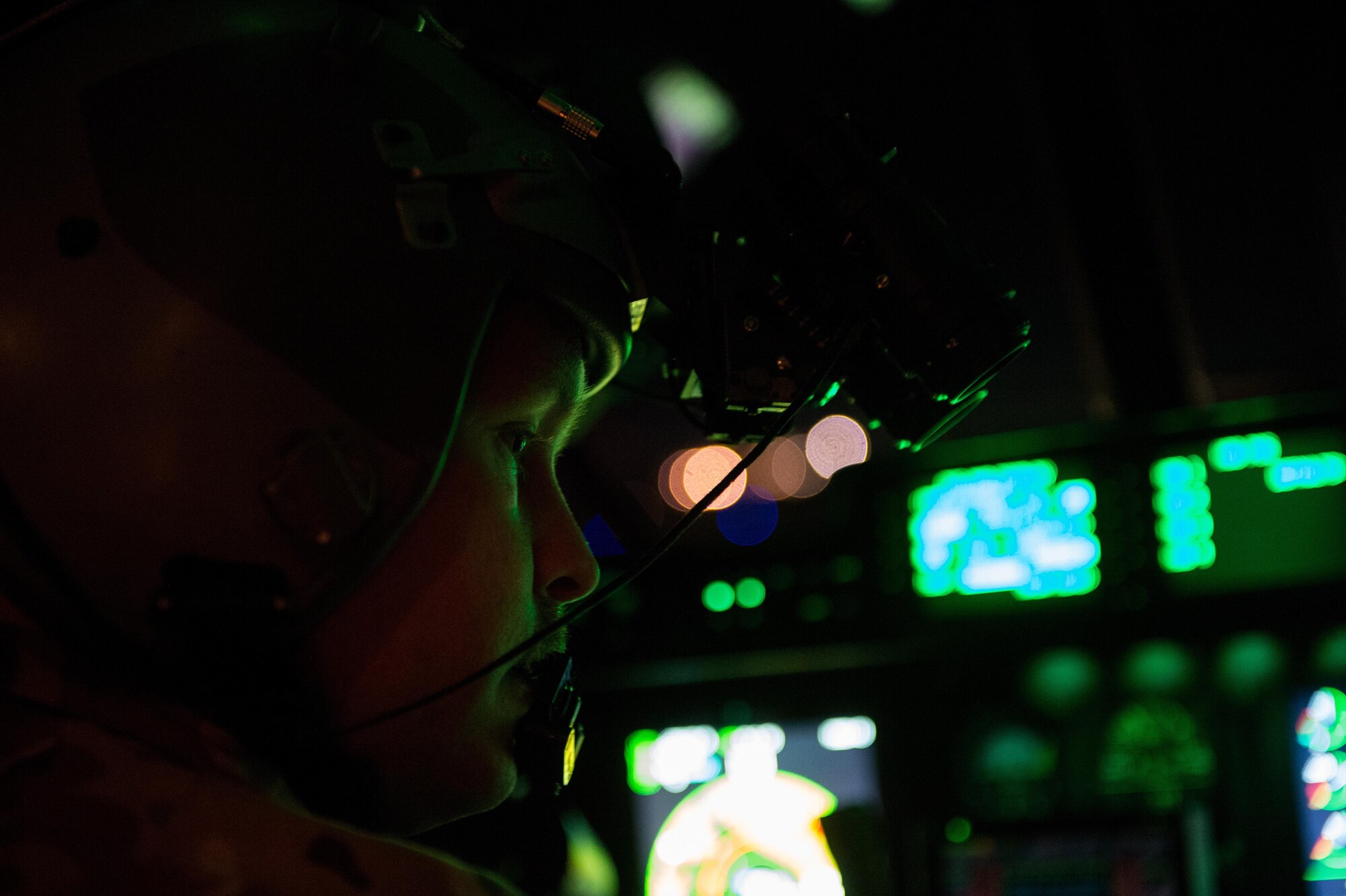U.S. Air Force Capt. Mark Domogala, 774th Expeditionary Airlift Squadron C-130J Super Hercules pilot, lands a C-130J at Bagram Air Field, Afghanistan, after delivering cargo to Jalalabad Air Field, May 25, 2015. U.S. Air Force cargo aircraft have delivered 19,900 short tons of cargo throughout Afghanistan this year. (U.S. Air Force photo by Tech. Sgt. Joseph Swafford/Released)