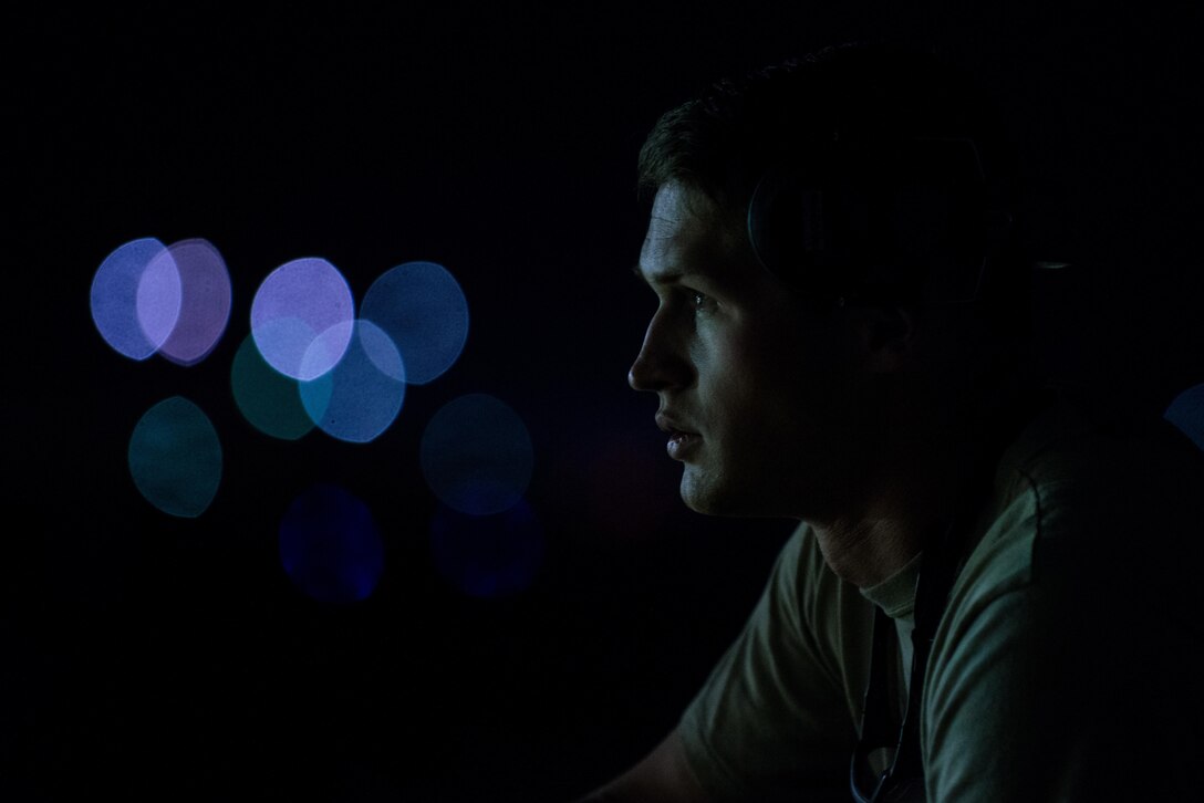 U.S. Air Force Staff Sgt. Brandon Brittain, 455th Expeditionary Maintenance Squadron crew chief, takes a break from digging while assisting the Crash, Damaged, Disabled Aircraft Recovery (CDDAR) team replace a tire on an F-16 Fighting Falcon aircraft that departed the runway while landing at Bagram Air Field, Afghanistan, May 4, 2015. The CDDAR team was able to expeditiously recover the aircraft and return the runway to operational status; the pilot was uninjured while the F-16 only sustained minor damage in the mishap. (U.S. Air Force photo by Tech Sgt. Joseph Swafford/Released)