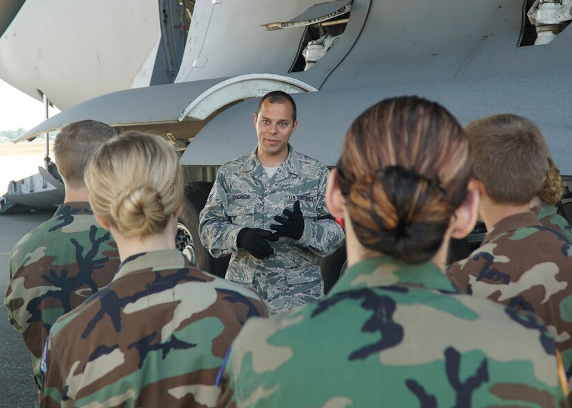 Tech. Sgt. James Goodrich, a jet propulsion mechanic with the 446 Aircraft Maintenance Squadron, explains aircraft maintenance to a group of Civil Air Patrol cadets June 6, 2015, during their visit to Joint Base Lewis-McChord. The CAP cadets toured JBLM’s control tower, simulator and a C-17 Globemaster III. (Air Force Reserve photo by Staff Sgt. Bryan Hull)