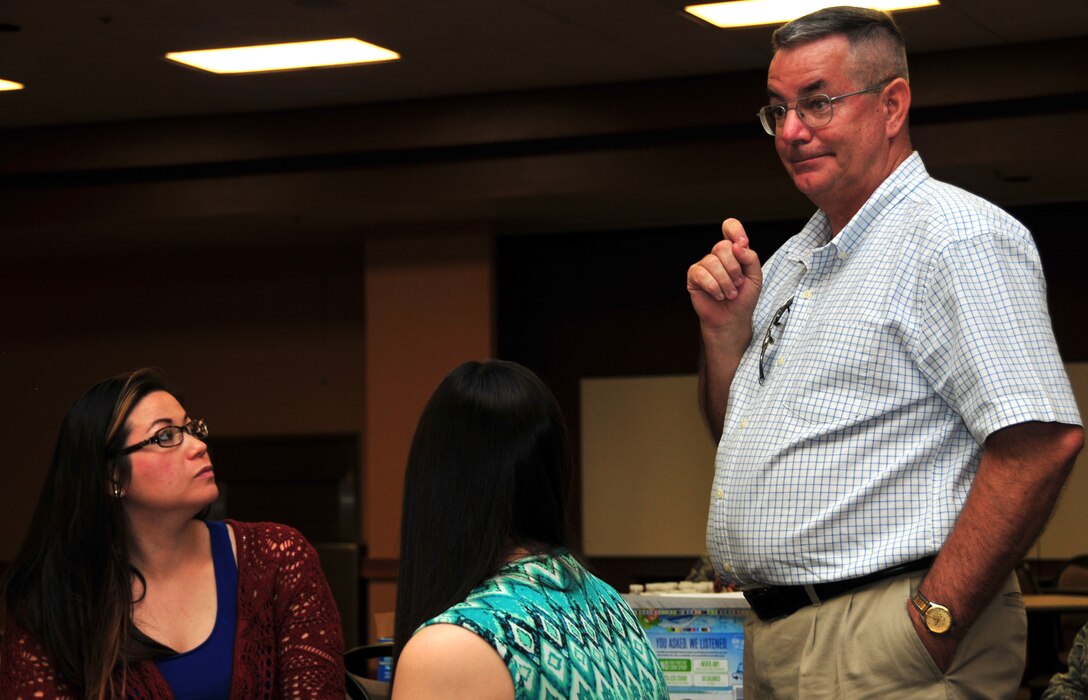 Mr. Brian Benbow, 161st Air Refueling Wing Airman and Family Readiness program manager, speaks to members of the key spouse program at the 161st Air Refueling Wing, Phoenix, June 7. The key spouse program is an official family program designed to enhance readiness, establish a sense of unity within the Air Force community and to address the needs of military families. (U.S. Air National Guard photo by Tech. Sgt. Michael Matkin)