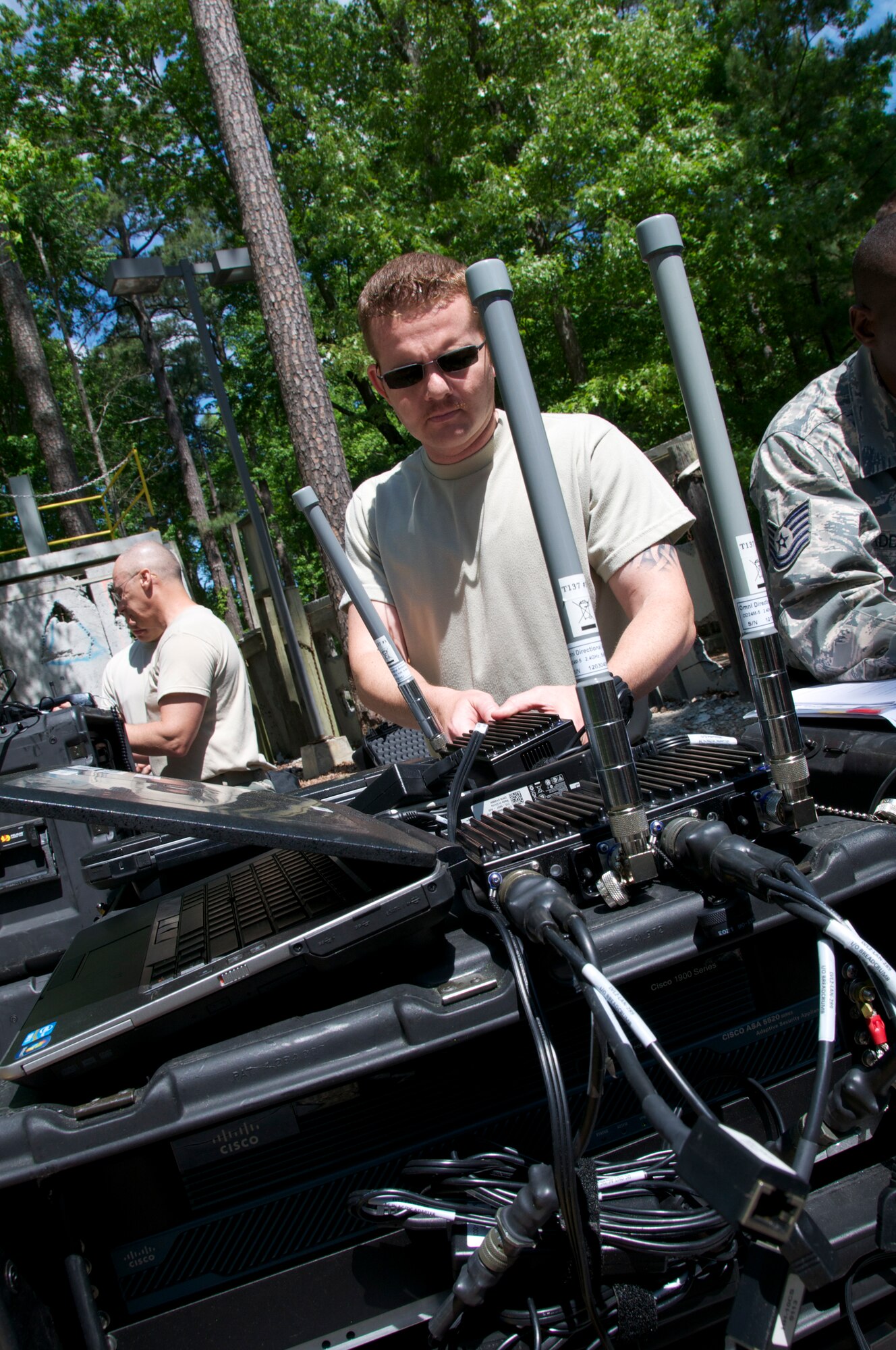 More than 45 airmen assigned to the Virginia Army and Air National Guard participated a six-day external evaluation involving scenarios that tested their Chemical, Biological, Radiological, Nuclear, and Explosive (CBRNE) Enhanced Response Force Package (CERFP) skills, May 11-16 at the Virginia Beach Fire and EMS Training Center in Virginia Beach, Virginia.  Members from the 192nd Fighter Wing Medical Group were required to perform medical triage by taking patients out of decontamination and examining them to determine how they should be medically treated. (U.S. Air National Guard photo by Master Sgt. Carlos J. Claudio/Released)
