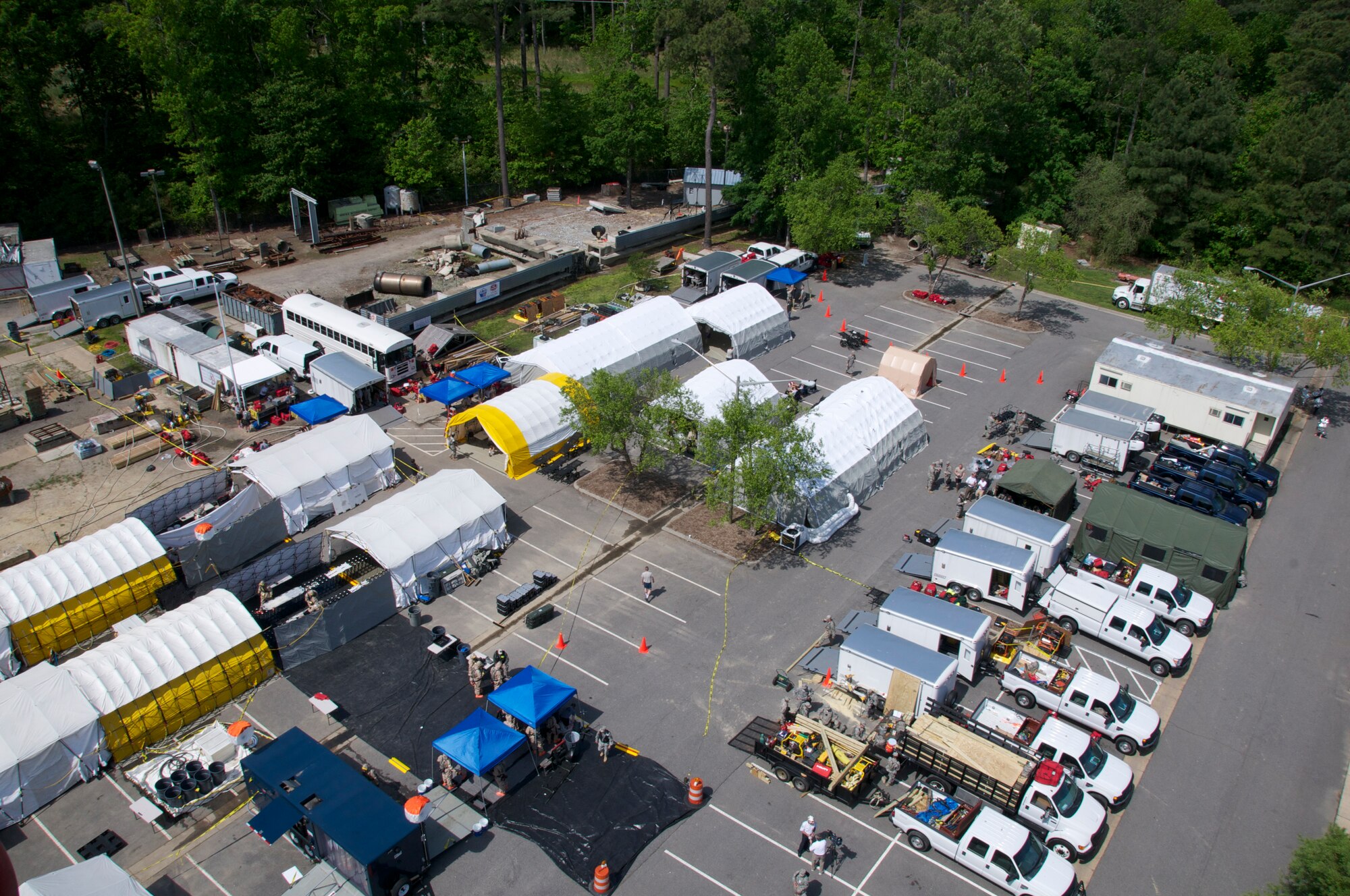 More than 45 airmen assigned to the Virginia Army and Air National Guard participated a six-day external evaluation involving scenarios that tested their Chemical, Biological, Radiological, Nuclear, and Explosive (CBRNE) Enhanced Response Force Package (CERFP) skills, May 11-16 at the Virginia Beach Fire and EMS Training Center in Virginia Beach, Virginia.  Members from the 192nd Fighter Wing Medical Group were required to perform medical triage by taking patients out of decontamination and examining them to determine how they should be medically treated. (U.S. Air National Guard photo by Master Sgt. Carlos J. Claudio/Released)
