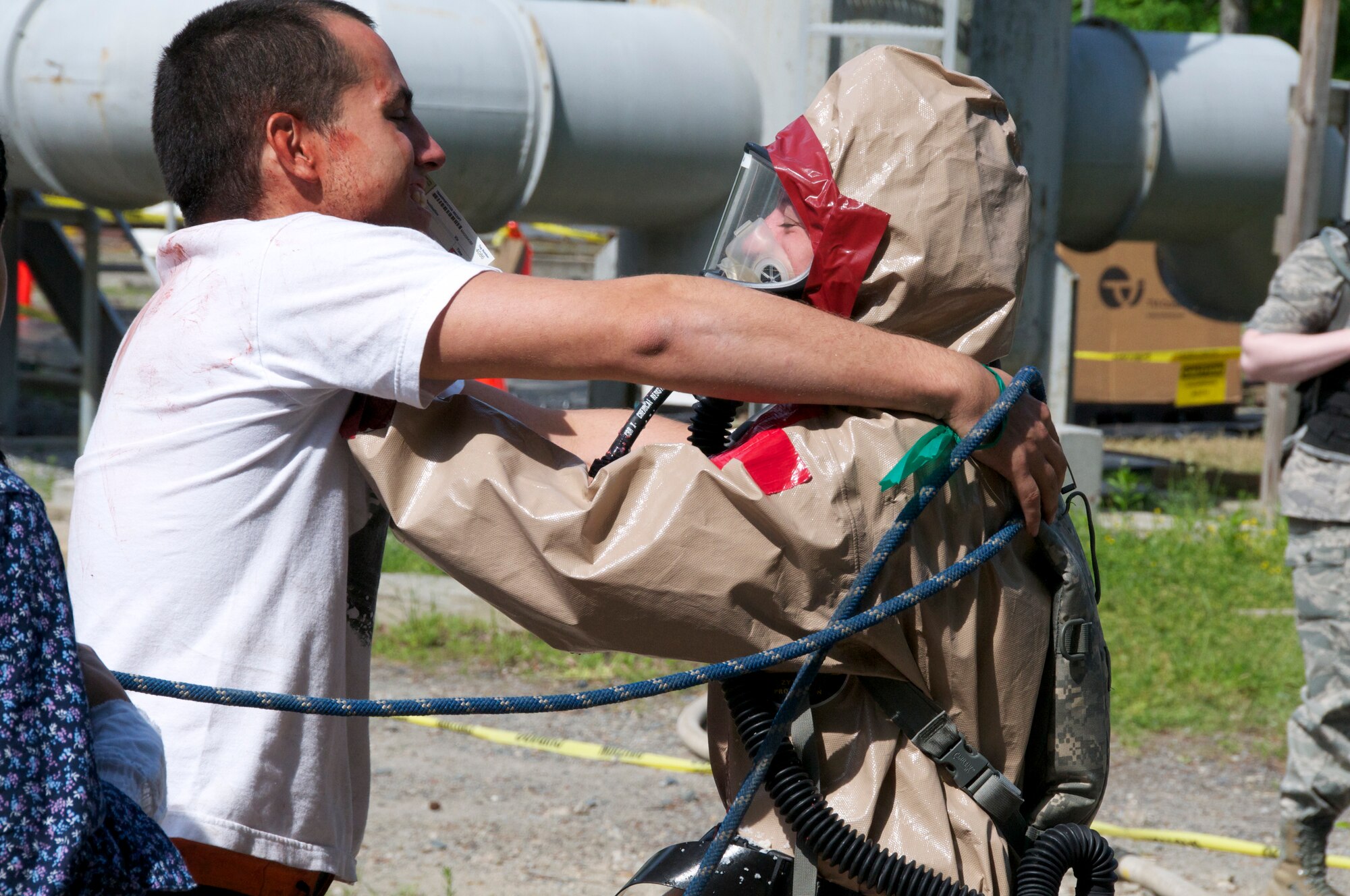 More than 45 airmen assigned to the Virginia Army and Air National Guard participated a six-day external evaluation involving scenarios that tested their Chemical, Biological, Radiological, Nuclear, and Explosive (CBRNE) Enhanced Response Force Package (CERFP) skills, May 11-16 at the Virginia Beach Fire and EMS Training Center in Virginia Beach, Virginia.  Members from the 192nd Fighter Wing Medical Group were required to perform medical triage by taking patients out of decontamination and examining them to determine how they should be medically treated. (U.S. Air National Guard photo by Master Sgt. Carlos J. Claudio/Released)
