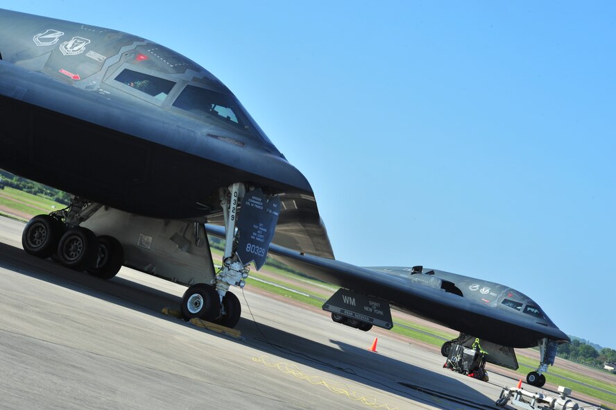 Two B-2 Spirits are prepared for refueling by 509th and 131st Aircraft Maintenance Squadron crew chiefs at Royal Air Force Fairford, England, June 7, 2015. The B-2 provides the penetrating flexibility and effectiveness inherent in manned bombers. Its low-observable, or “stealth,” characteristics give it the unique ability to bypass an enemy’s most sophisticated defenses. (U.S. Air Force photo/Senior Airman Malia Jenkins)