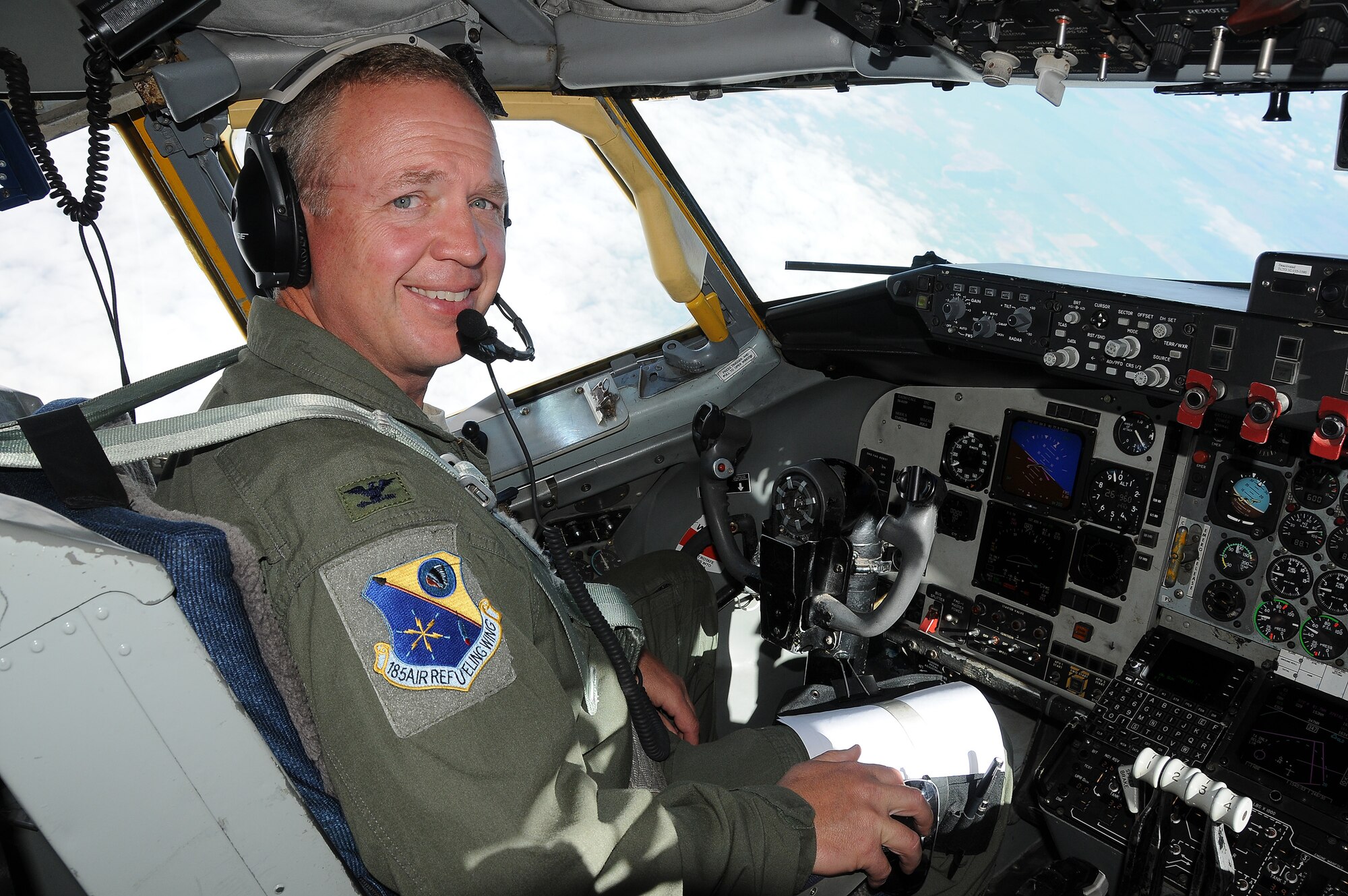 185th Air Refueling Wing Commander Col Larry Christensen pilots an Air Force KC-135R during a local training mission on Thursday June 4, 2015. The flight originated from the Iowa Air National Guard unit's home base in Sioux City, Iowa. (U.S. Air National Guard photo by Master Sgt. Vincent De Groot/Released)