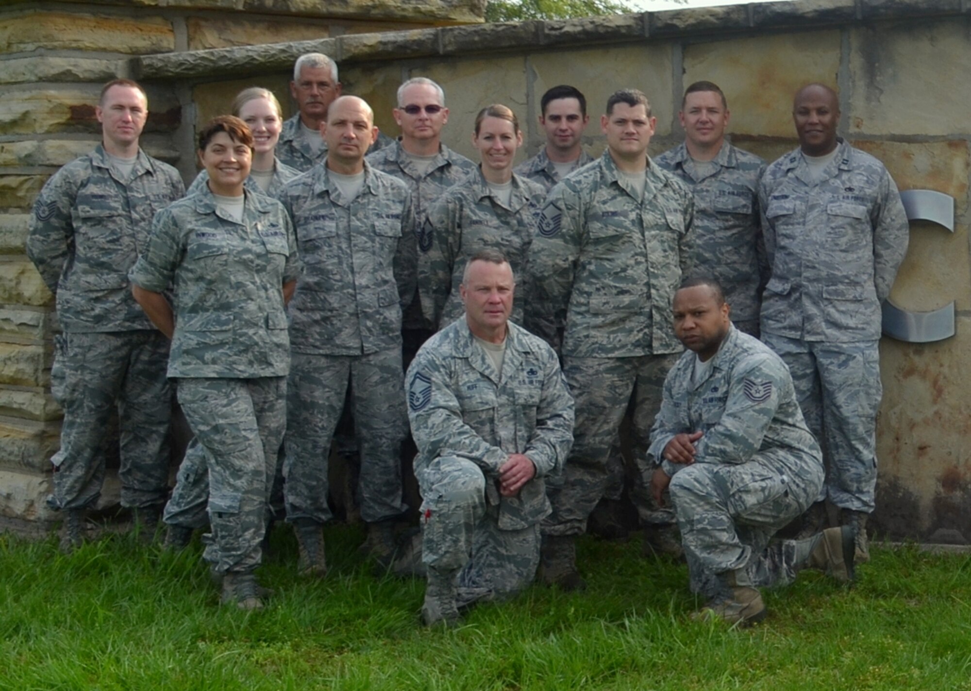 Members of the Missouri Air National Guard’s 131st Bomb Wing who served as support staff during the 131st’s state emergency response training at Camp Clark, near Nevada, Missouri, June 6, 2015. Standing from left to right are Tech. Sgt. Pete Young, Master Sgt. Kirsten Inwood, Tech. Sgt. Stephanie Mundwiller, Senior Master Sgt. Kirk Lindell, Master Sgt. James Bradley, Senior Master Sgt. John Chaffee, Master Sgt. Jen Fanoele, Tech. Sgt. Joe Hudson, Master Sgt. Joshua Adkins, Master Sgt. Ronnie Bylo, Capt. Aaron Armstrong, and kneeling are Senior Master Sgt. Ken Huff and Tech. Sgt. Jarrad Luckey.
(U.S. Air National Guard photo by 2nd Lt. Justin Clark)