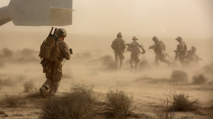 Marines and Sailors with India Company, 3rd Battalion, 7th Marine Regiment, Special Purpose Marine Air Ground Task Force – Crisis Response – Central Command, escort a simulated casualty to an MV-22 Osprey during a tactical recovery of aircraft and personnel training exercise, May 29, 2015, in Southwest Asia. With U.S. and coalition forces conducting airstrikes in support of Operation Inherent Resolve, the TRAP forces of the SPMAGTF provide an on-call force dedicated to the safe return of the U.S. and coalition service members. (U.S. Marine Corps Photo by Cpl. Garrett D. White, CJTF-OIR Public Affairs)