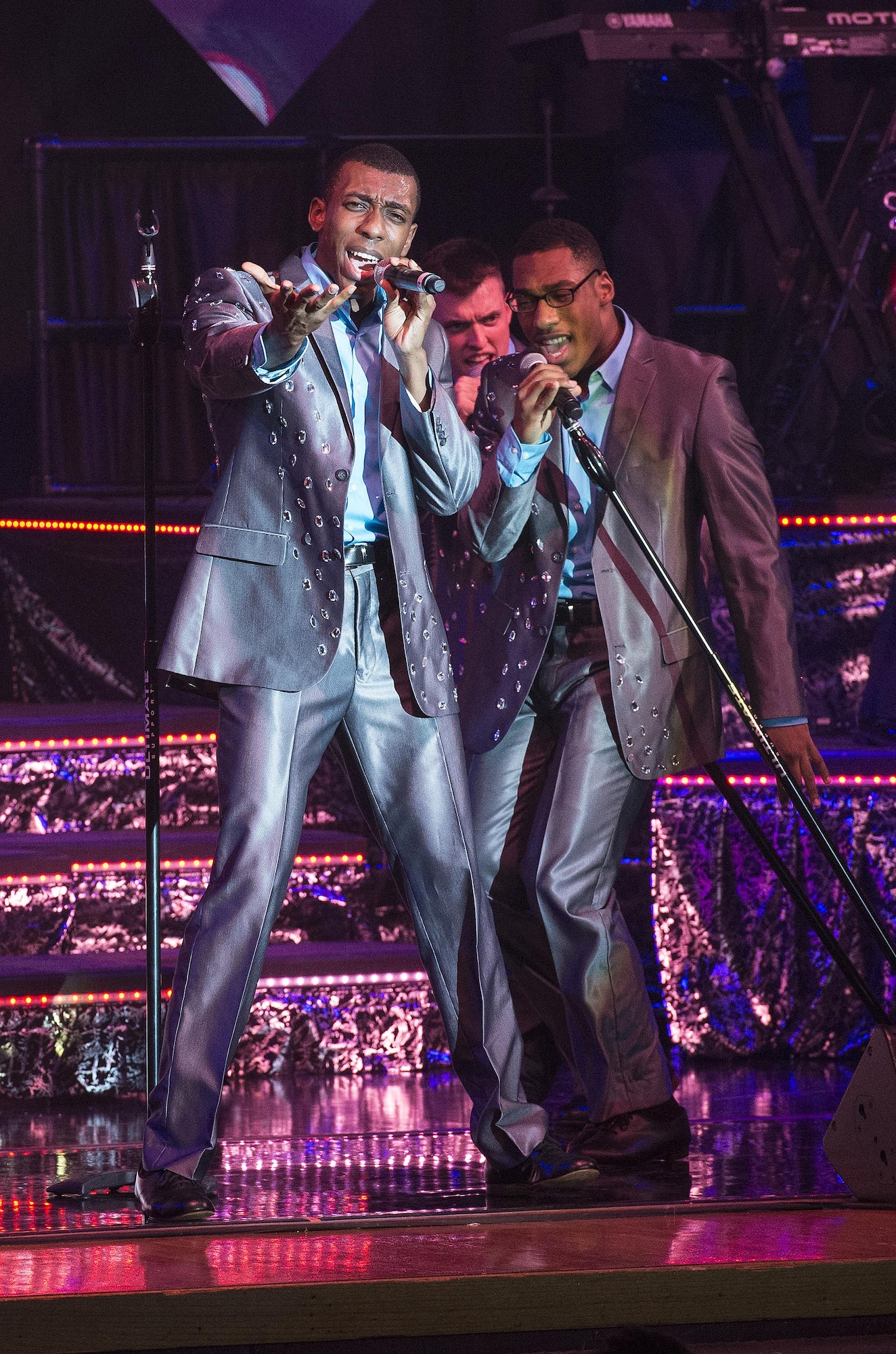 Airman 1st Class Rashaun Carter performs “Sugar” by Maroon 5, May 29, at the Bob Hope Theater, Joint Base San Antonio-Lackland, Texas. TIB performed a dress rehearsal of its World Tour 2015 for an audience of basic trainees in preparation for its first performance in Fort Walton Beach, Florida, June 6. This year’s world tour will stop at locations all over the globe. (U.S. Air Force photos/Johnny Saldivar/Released)