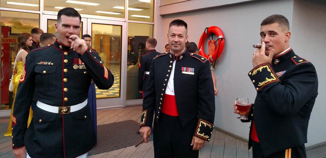 29 May 2015 – (L to R) SSgt Lewis, Maj Kosnik, and Maj Mann strike a pose at the Weapons Training Battalion Dining In on the observation deck to the USS North Carolina.