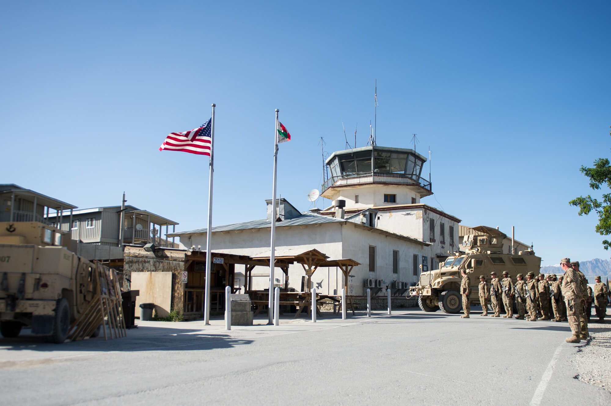 U.S. service members participate in a remembrance ceremony and retreat at Bagram Air Field, Afghanistan, May 26, 2015. Service members at Bagram gathered during the ceremony to remember those who gave their lives while deployed to Afghanistan. (U.S. Air Force photo by Tech. Sgt. Joseph Swafford/Released)