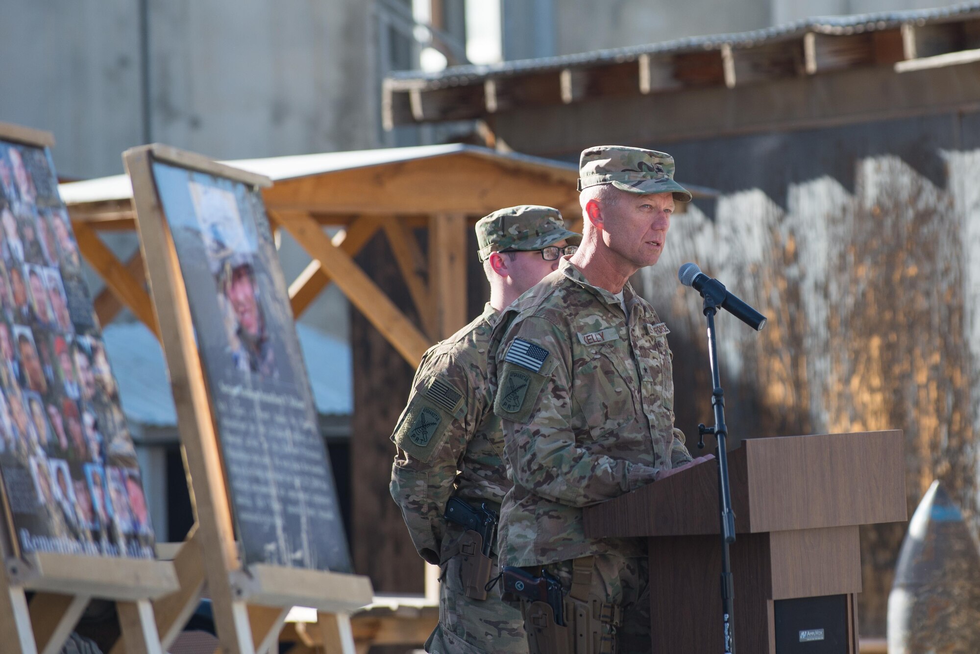 U.S. Air Force Brig. Gen. Mark D. Kelly, 455th Air Expeditionary Wing commander, gives a speech during a remembrance ceremony and retreat at Bagram Air Field, Afghanistan, May 26, 2015. Service members at Bagram gathered during the ceremony to remember those who gave their lives while deployed to Afghanistan. (U.S. Air Force photo by Tech. Sgt. Joseph Swafford/Released)
