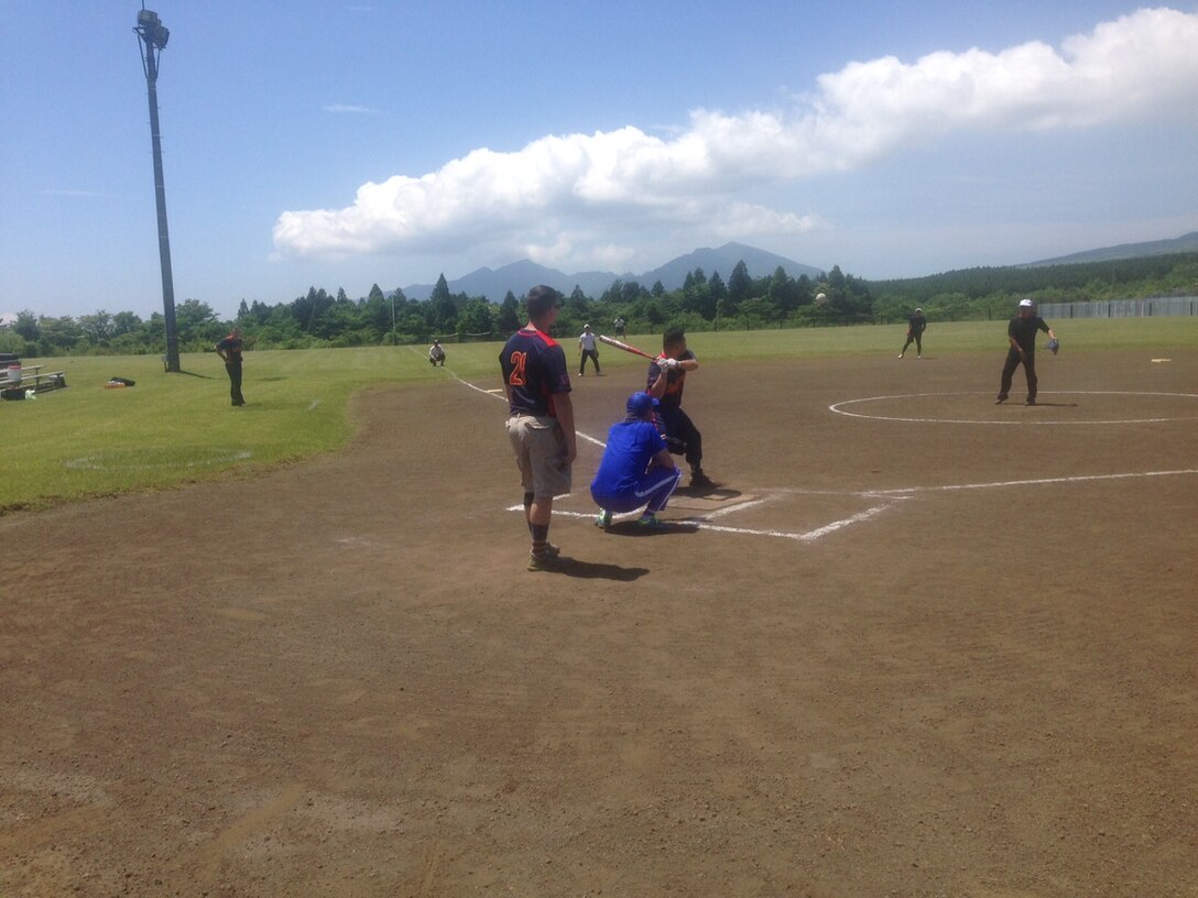 Sgt Lyons looks to crush the ball during the 1st Annual Camp Fuji - JGSDF - Fuji Friendship Association Sports Tournament.