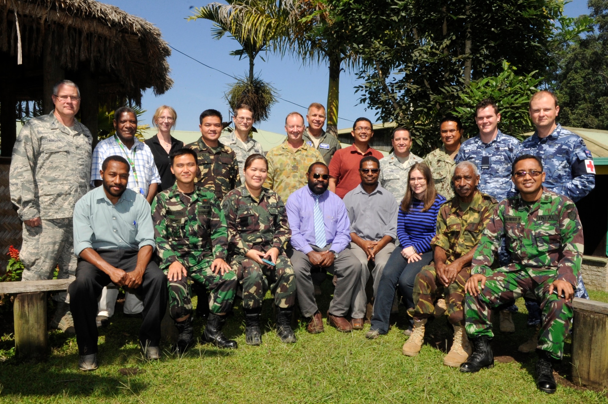 Military doctors from the U.S., Australia, Philippines, Indonesia and Papua New Guinea pause for a photo with researchers from the Papua New Guinea Institute of Medical Research during Pacific Angel 15-4 at Goroka, Papua New Guinea, June 4, 2015. The group spent the day discussing how best to deal with evolving tropical diseases, build disease monitoring and treatment programs, and how to maximize limited resources for best results. Efforts undertaken during Pacific Angel help multilateral militaries in the Pacific improve and build relationships across a wide spectrum of civic operations, which bolsters each nation???s capacity to respond and support future humanitarian assistance and disaster relief operations. (U.S. Air Force photo by Staff Sgt. Marcus Morris/Released)