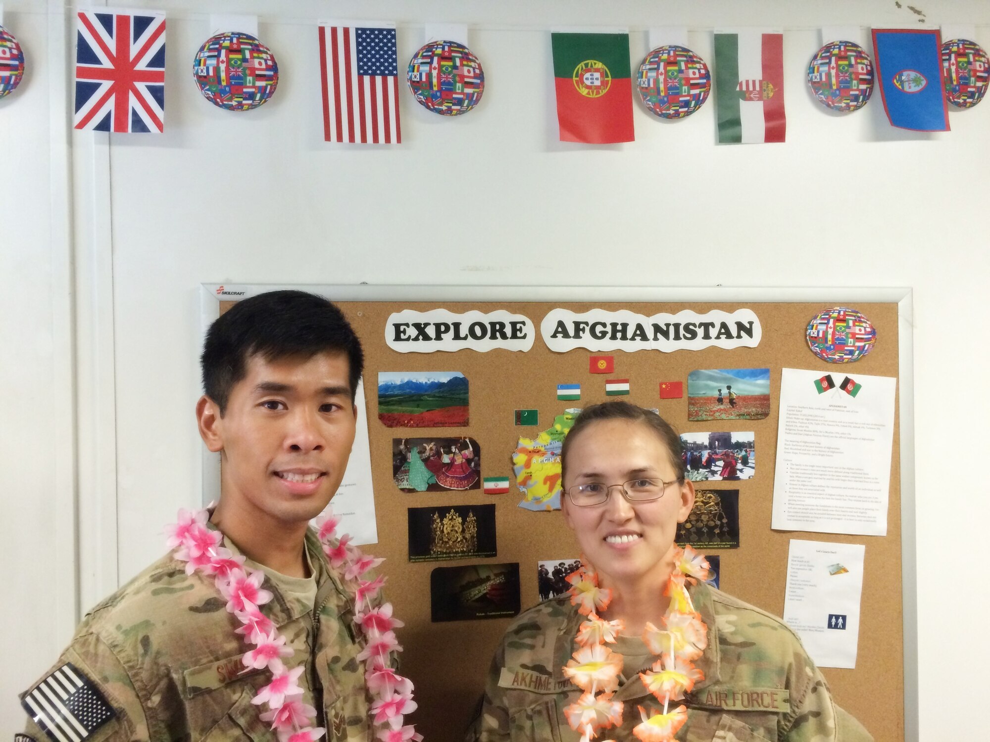 Senior Airman Steven Swei (left), 62nd Aircraft Maintenance Squadron communications, navigations and mission systems specialist, and Senior Airman Aigerim Akhmetova, 455th Expeditionary Aircraft Maintenance Squadron C-17 supply clerk, pose for a photo June 5, 2015, during Culture day at Bagram Air Field, Afghanistan. (Courtesy photo)