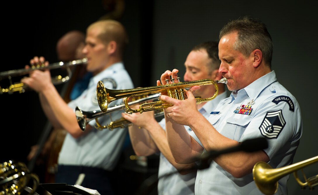 Senior Master Sgt. Kevin Burns, Airmen of Note NCO in charge, plays the trumpet during the Great American Brass Band Festival at the Norton Center for the Arts in Danville, Ky., June 5, 2015. In addition to the performance, the band also held a Q-and-A with audience members. (U.S. Air Force photo by Staff Sgt. Chad C. Strohmeyer)(Released)