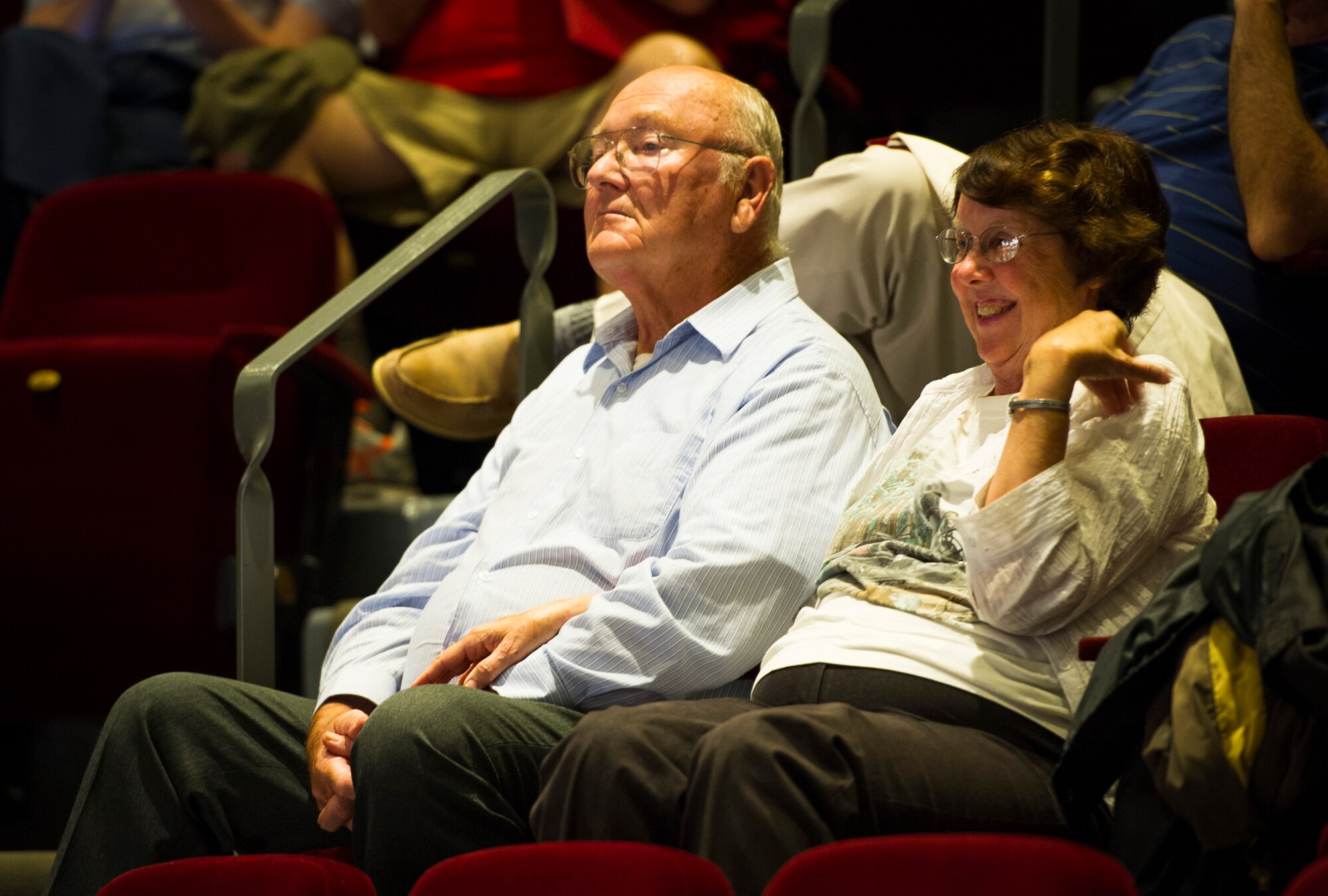 An audience member smiles as she listens to the U.S. Air Force Band Airmen of Note perform during the Great American Brass Band Festival at the Norton Center for the Arts in Danville, Ky., June 5, 2015. The band performed several songs with a Q-and-A session at the end. (U.S. Air Force photo by Staff Sgt. Chad C. Strohmeyer)(Released)
