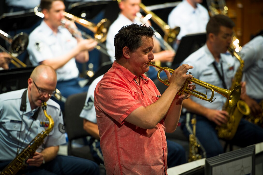 Rex Richardson plays the trumpet with the U.S. Air Force Band Airmen of Note during the Great American Brass Band Festival at the Norton Center for the Arts in Danville, Ky., June 5, 2015. Afterwards, the Airmen of Note members held a reading session with members of the audience. (U.S. Air Force photo by Staff Sgt. Chad C. Strohmeyer)(Released)