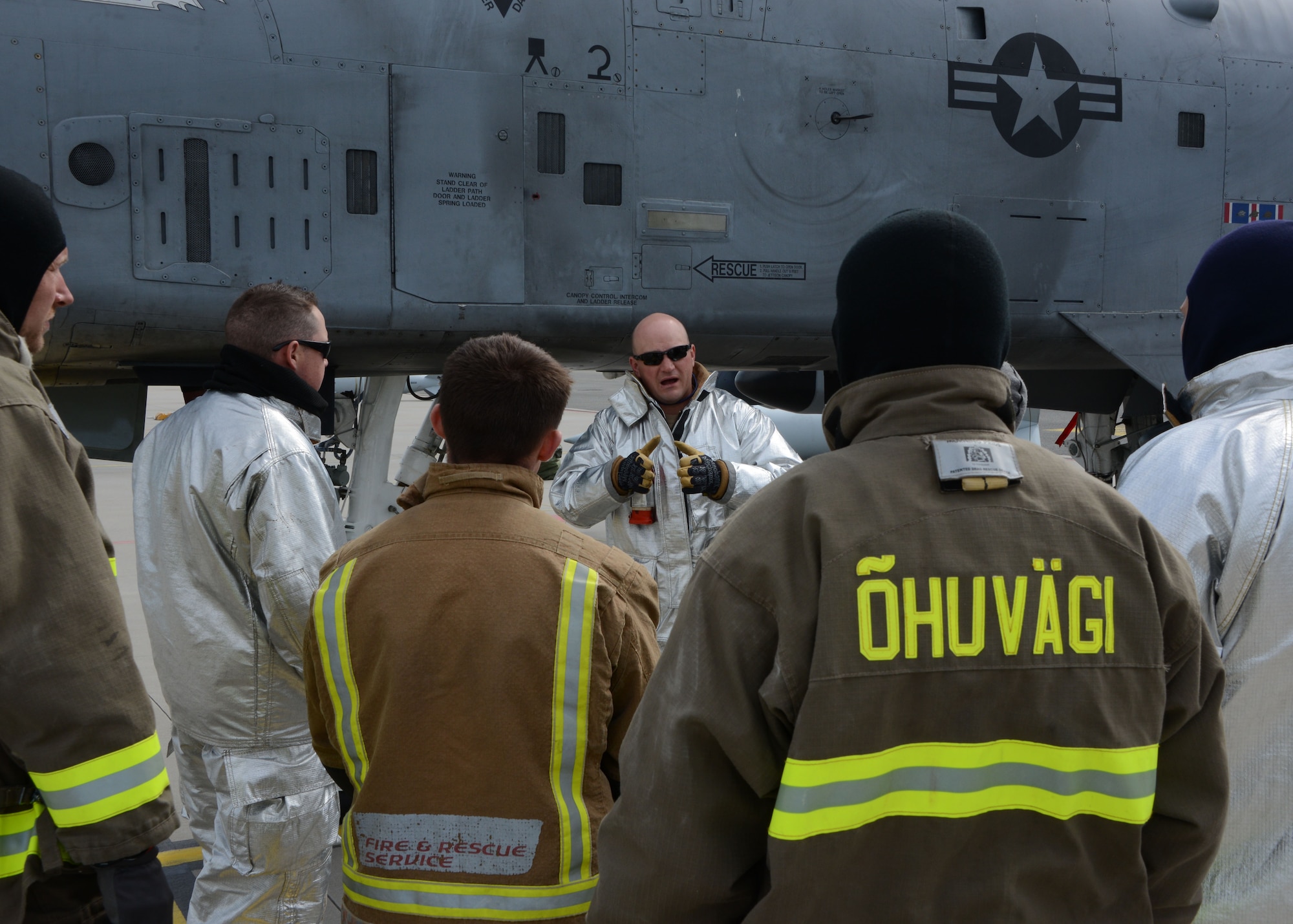 Firefighters assigned to the 175th Wing, Maryland Air National Guard, train their Estonian and British counterparts on the proper procedures for extraction from an A-10C Thunderbolt II aircraft during Saber Strike 15 at Ämari Air Base, Estonia, June 8, 2015. Saber Strike is an exercise that aims to continue to improve U.S. interoperability with ally and partner nations, while increasing their capacity to conduct a full spectrum of military operations. (Air National Guard photo by Tech. Sgt. Christopher Schepers)