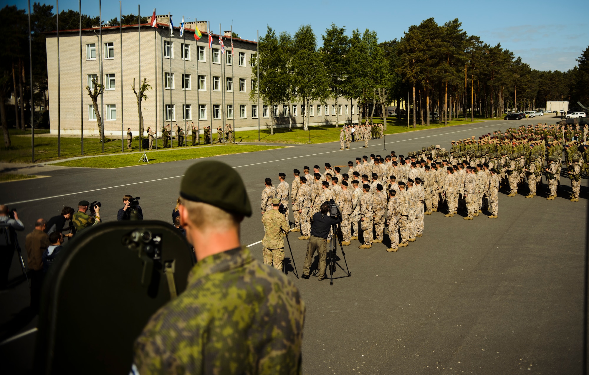 Members of multiple nations gather for opening ceremonies to kick off Saber Strike 15 June 8, 2015, Adazi Training Area, Latvia. More than 6,000 service members are participating in Saber Strike 15 an annual multinational exercise designed to strengthen and develop interoperability and friendships between Baltic Area regions and NATO members to ensure regional security. (U.S. Air Force photo/ Staff Sgt. Armando A. Schwier-Morales)