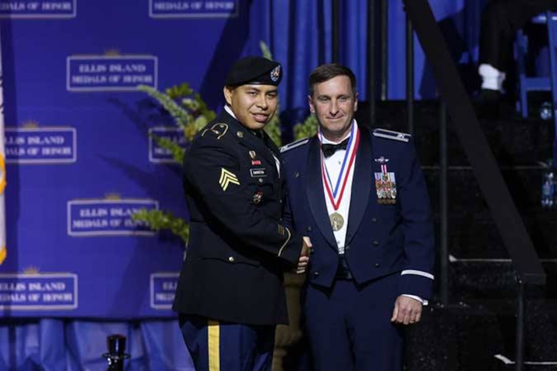 Colonel Keefe received Ellis Island Medal of Honor, May 9, 2015. The ELLIS ISLAND MEDALS OF HONOR are awarded annually to a group of distinguished American citizens who exemplify a life dedicated to community service. These are individuals who preserve and celebrate the history, traditions and values of their ancestry while exemplifying the values of the American way of life, and who are dedicated to creating a better world for us all.  The National Ethnic Coalition of Organizations - NECO- was created on the conviction of its founders that the diversity of the American people
is what makes this nation great.  Its mission is to honor and preserve this diversity and to foster tolerance, respect and understanding among religious and ethnic groups.  NECO sponsors the Ellis Island Medals of Honor which are presented annually to American citizens who have distinguished themselves within their own ethnic groups while exemplifying the values of the American way of life.  Past Medalists include six U.S. President, one foreign President, Nobel Prize winners and leaders of industry, education, the arts, sports and government, along with everyday Americans who have made freedom, liberty and compassion a part of their life's work.  Each year, Ellis Island Medal of Honor recipients are listed in the Congressional Record, honoring those who have made enduring contributions to our nation and to the world. 

Past recipients: Presidents Bill Clinton, George H.W. Bush, Ronald Reagan, Jimmy Carter, Gerald Ford, and notable figures such as Rosa Parks, Cesar E. Chavez, Muhammad Ali, Frank Sinatra, Wayne Newton, Itzhak Perlman, Joe DiMaggio, Gloria and Emilio Estefan, Bob Hope, Quincy Jones, Mickey Mantle and many other distinguished entertainers, prominent religious figures, successful entrepreneurs, senators, congressmen, and military personnel. 
