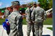 MCGHEE TYSON AIR NATIONAL GUARD BASE, Tenn. - An NCO academy student holds the I.G. Brown Training and Education Center flag under his arm here, June 4, 2015, during the day's retreat. The TEC holds the largest and longest continually running NCO academy in the U.S. Air Force. (U.S. Air National Guard photo by Master Sgt. Mike R. Smith/Released)  