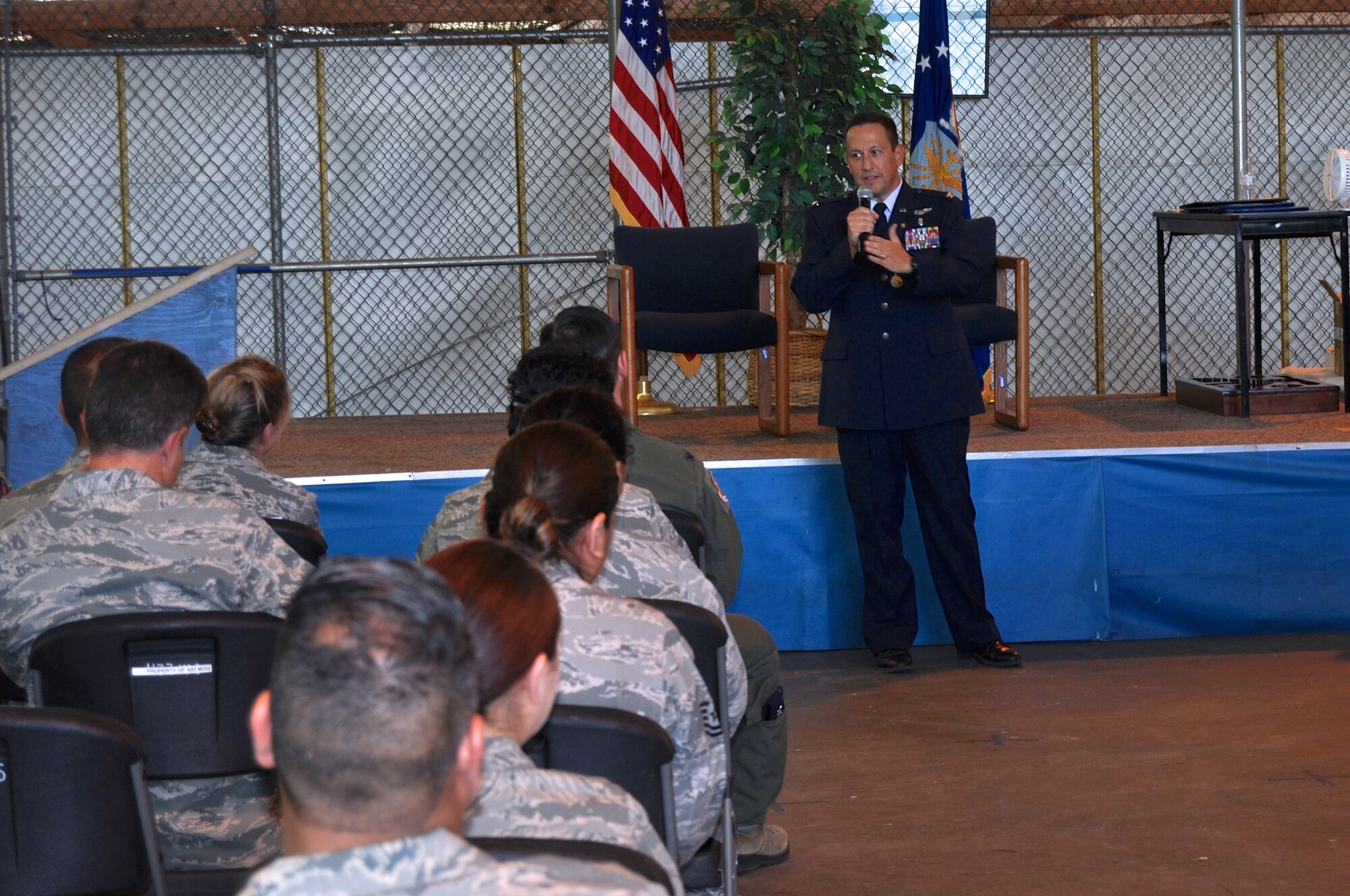 Col. Anthony Pena, 433rd Medical Squadron commander, addresses the audience during his retirement ceremony held at Joint Base San Antonio-Lackland June 6. He thanked everyone for their dedication to the 433rd's mission and the support for him as he wraps up his 32-year-long Air Force career. (U.S. Air Force photo/Senior Airman Bryan Swink)

