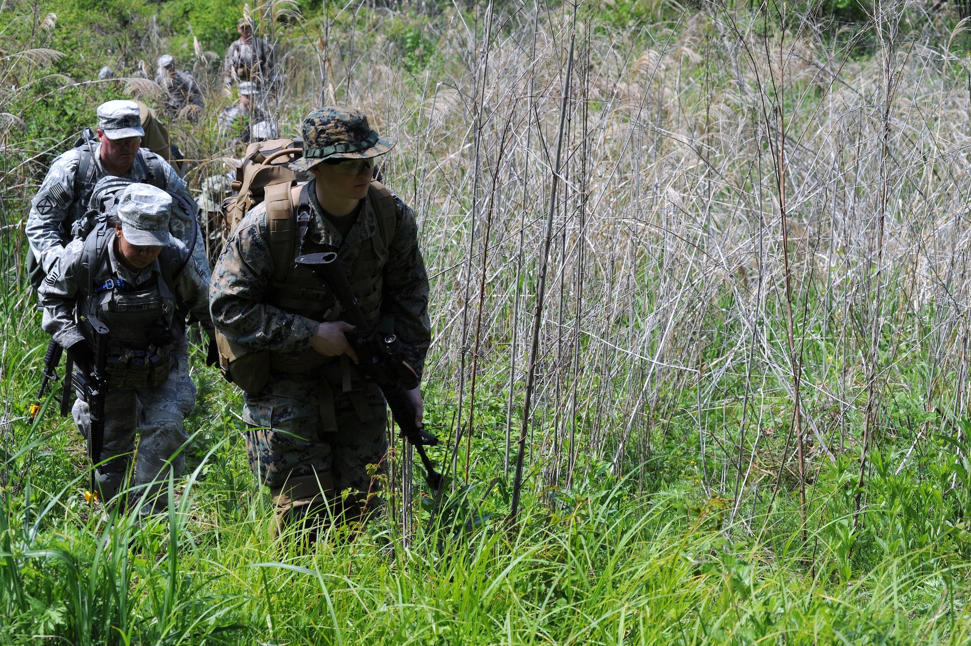 (Left) Seventh Air Force First Sergeant Master Sgt. Cynthia Schmitz was one of 18 Air Force participants in the "2015 Mangudai Warrior Challenge," a 58-hour event that paired U.S. senior enlisted leaders from each military branch with their Republic of Korea counterparts to accomplish different tasks through a range of scenarios while operating on limited food and sleep.  The United States Forces Korea event held May 13-15, 2015, is in its second year. (U.S. Army photo by Staff Sgt. Mark A. Kauffman)