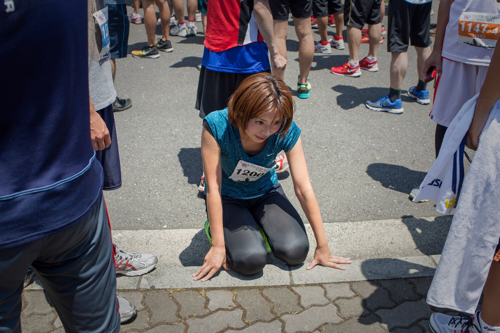 A runner finished a 5k relay run during the 31st annual Ekiden Run at Yokota Air Base, Japan, June 7, 2015. The Yokota Striders running club sponsored the annual Ekiden Run consisting of three different races at this event: a 4-person 5k relay, 5k race, and 2k Kid’s Run. (U.S. Air Force photo by Osakabe Yasuo/Released) 