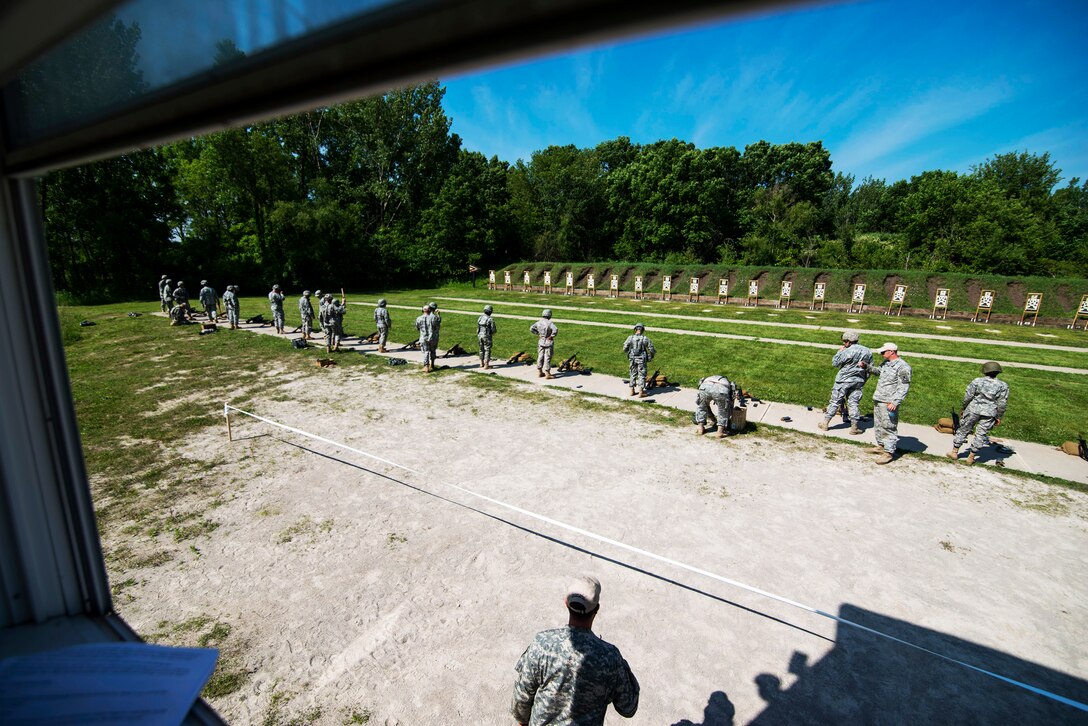 Soldiers prepare to shoot during range qualifications on the Joliet