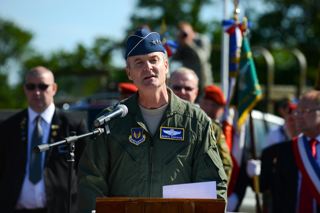 U.S. Air Force Lt. Gen. Darryl Roberson speaks during a ceremony at the 9th Air Force Memorial in Picauville, France, June 4, 2015. More than 380 service members from Europe and affiliated D-Day historical units participated in the 71st anniversary of the D-Day invasion as part of Joint Task Force D-Day 71. Roberson commands the 3rd Air Force and 17th Expeditionary Air Force.