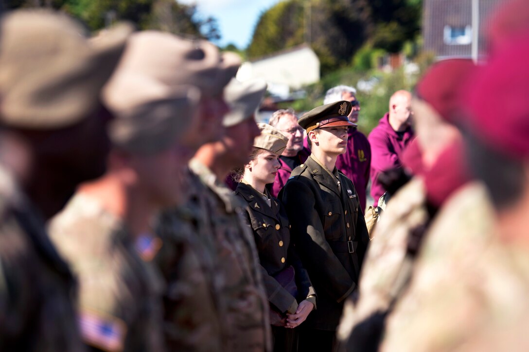 Antoine and Alice Fernandez, dressed in vintage World War II U.S. Army uniforms, attend a WWII ceremony to commemorate D-Day in Sainte Laurent sur Mer, France, June 6, 2015. 