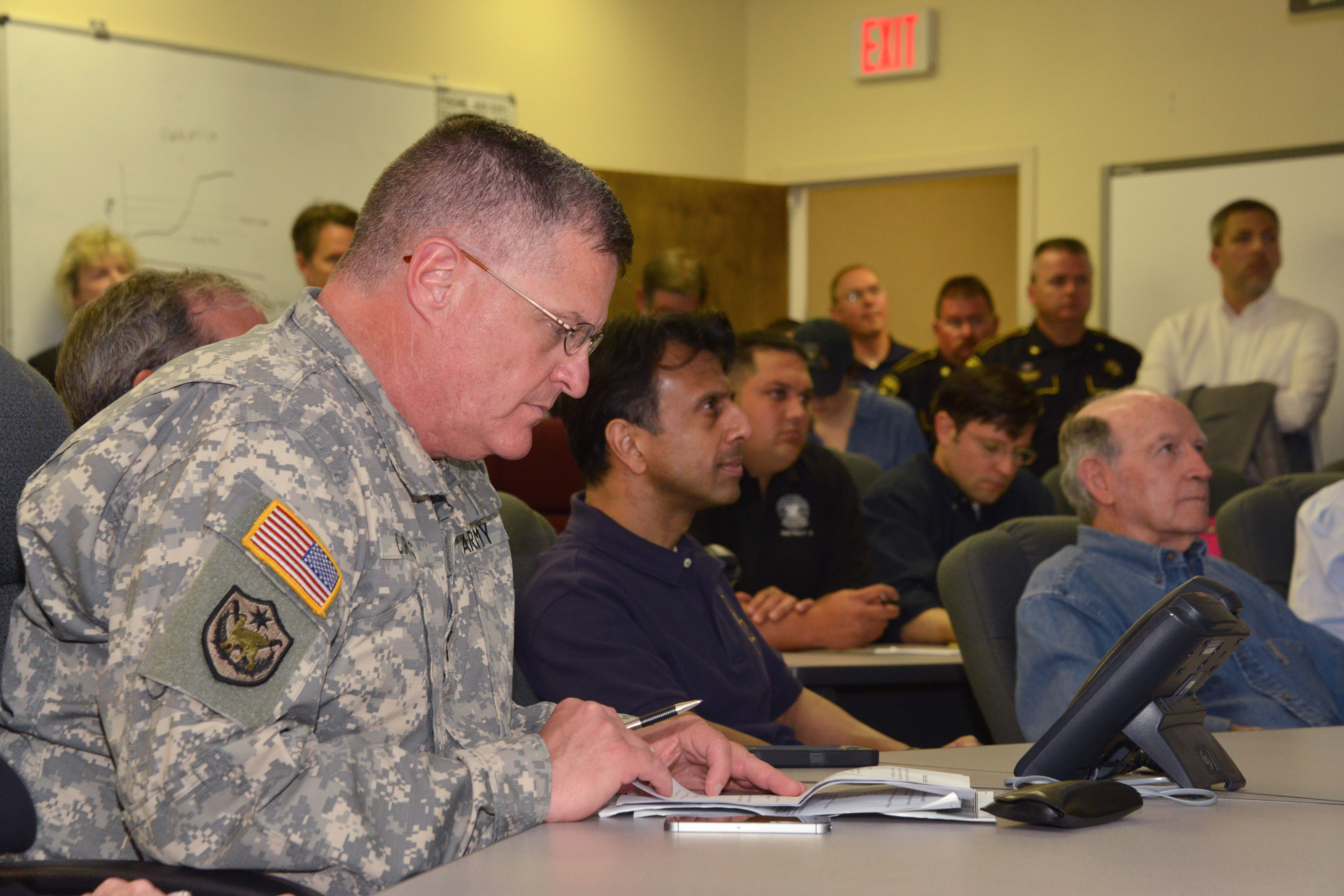 Army Maj. Gen. Glenn H. Curtis, left, adjutant general of the Louisiana