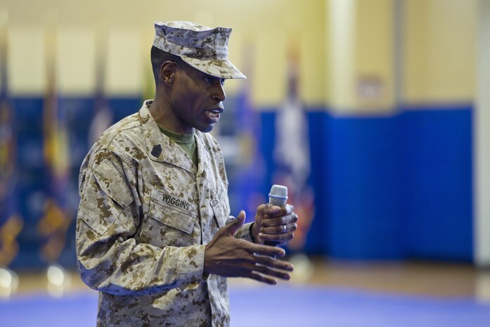 U.S. Marine Corps Sgt. Maj. Clifford Wiggins, sergeant major, Command Element Marine Forces Central Command Forward, speaks at the unit's relief and appointment ceremony aboard Naval Support Activity, Bahrain, June 7, 2015. Wiggins replaced Sgt. Maj. Mario Marquez as sergeant major of the unit. (U.S. Marine Corps photo by Cpl. Sean Searfus CE MARFOR CENTCOM FWD COMCAM/Released)