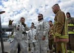 Firefighters assigned to the 175th Wing, Maryland Air National Guard, train their Estonian and British counterparts on the proper procedures for extraction from an A-10C Thunderbolt II aircraft during Saber Strike 15 at Ämari Air Base, Estonia, June 8, 2015. Saber Strike is an exercise that aims to continue to improve U.S., allied partners, and participating nations' interoperability, while increasing their capacity to conduct a full spectrum of military operations. 