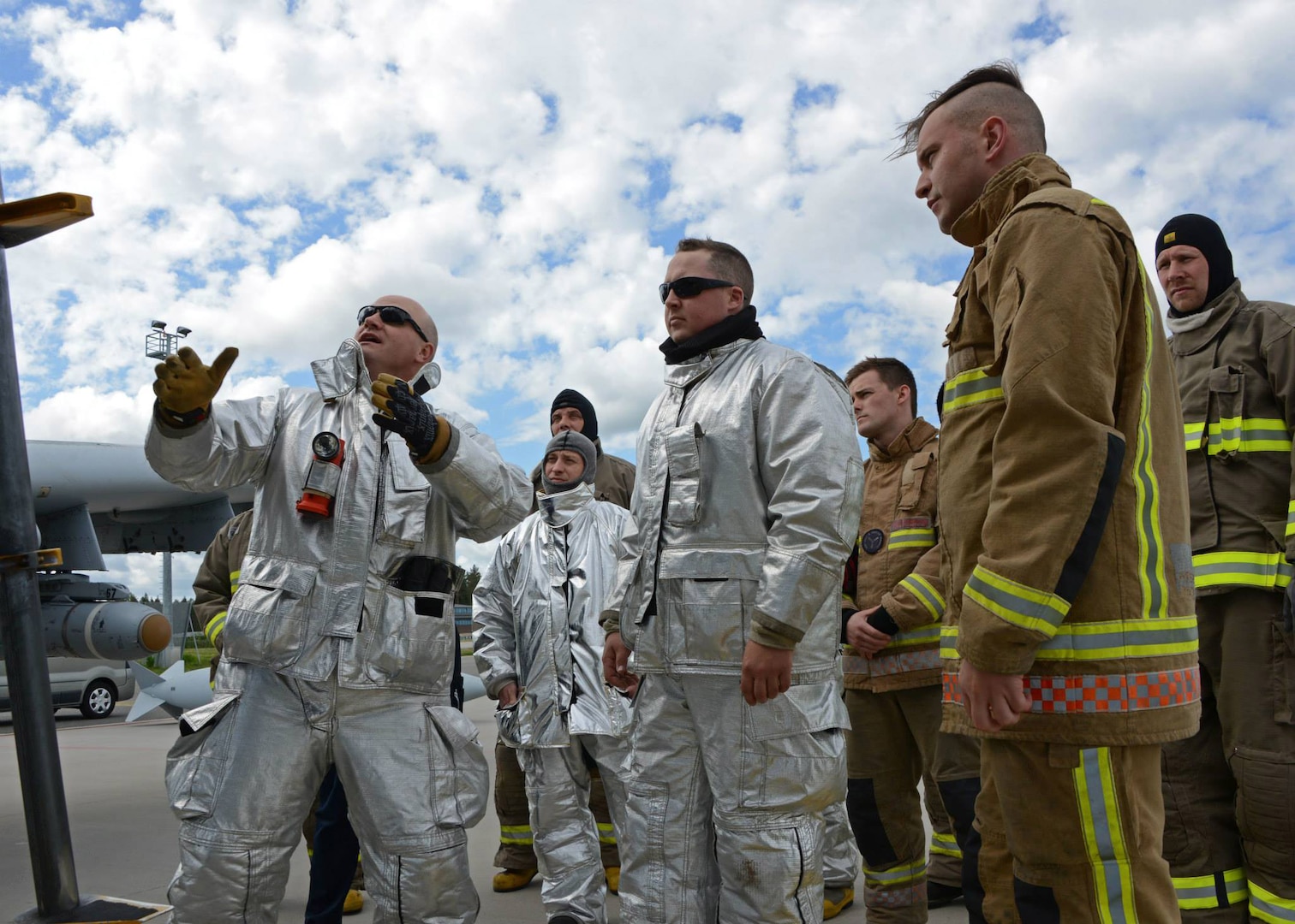 Firefighters assigned to the 175th Wing, Maryland Air National Guard, train their Estonian and British counterparts on the proper procedures for extraction from an A-10C Thunderbolt II aircraft during Saber Strike 15 at Ämari Air Base, Estonia, June 8, 2015. Saber Strike is an exercise that aims to continue to improve U.S., allied partners, and participating nations' interoperability, while increasing their capacity to conduct a full spectrum of military operations. 