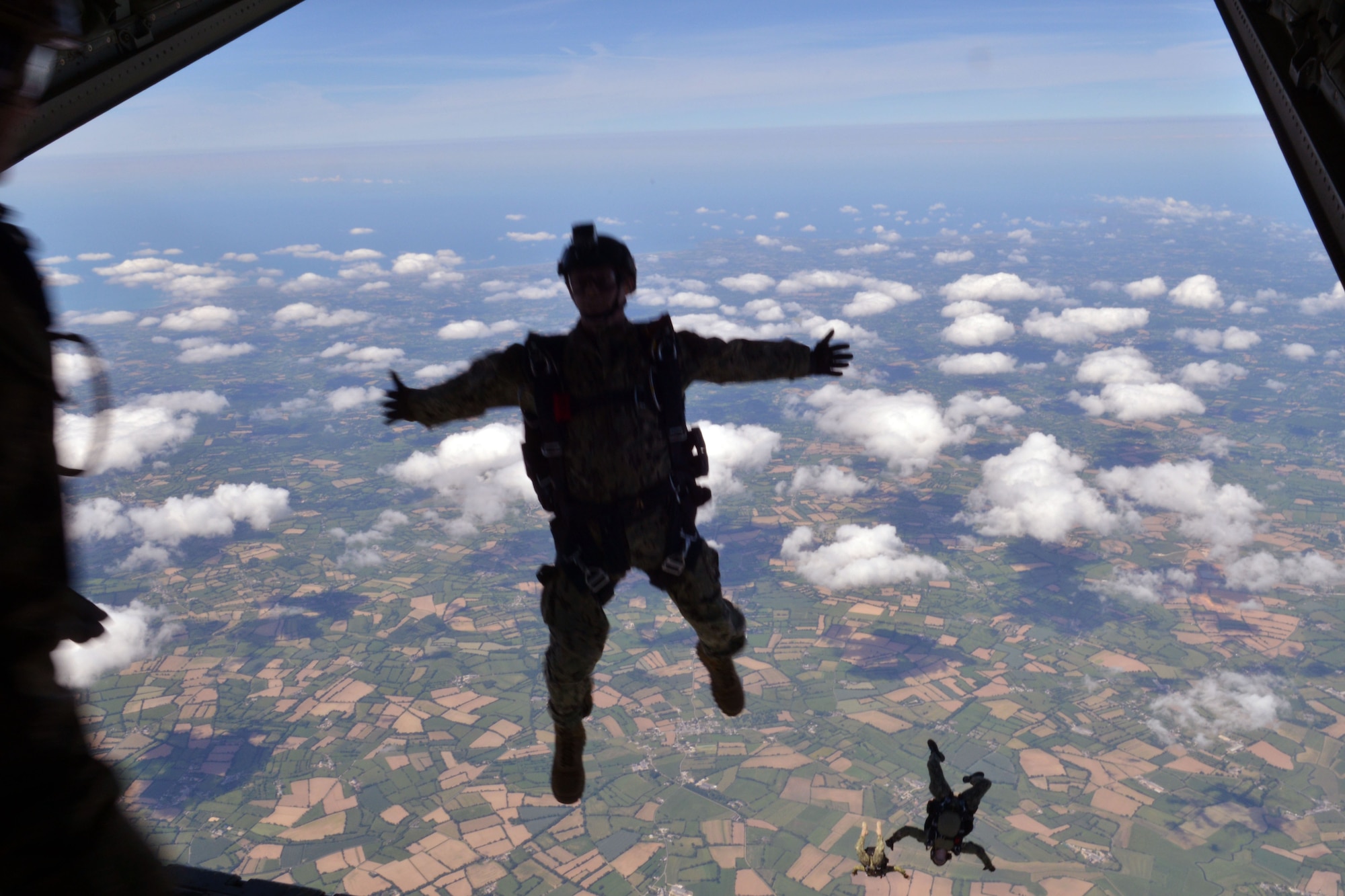 U.S. Special Operations Command -- Europe operators jump off the ramp of an MC-130J Commando II assigned to the 67th Special Operations Squadron at RAF Mildenhall, England, to perform military free fall to the historic La Fiere drop zone near Sainte Mere Eglise, Normandy, France, June 7, 2015, to commemorate the 71st anniversary of D-Day. More than 60 SOCEUR operators performed the MFF jumps which were a small portion of the commemorative events which took place in strategic World War II sites throughout Normandy. (U.S. Air Force photo by Tech. Sgt. Stacia Zachary)