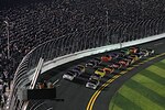 Dale Earnhardt Jr., driver of the No. 88 National Guard NASCAR racecar, leads the field at the pole position at the Daytona International Speedway in Daytona Beach, Fl., Feb. 12, 2011.