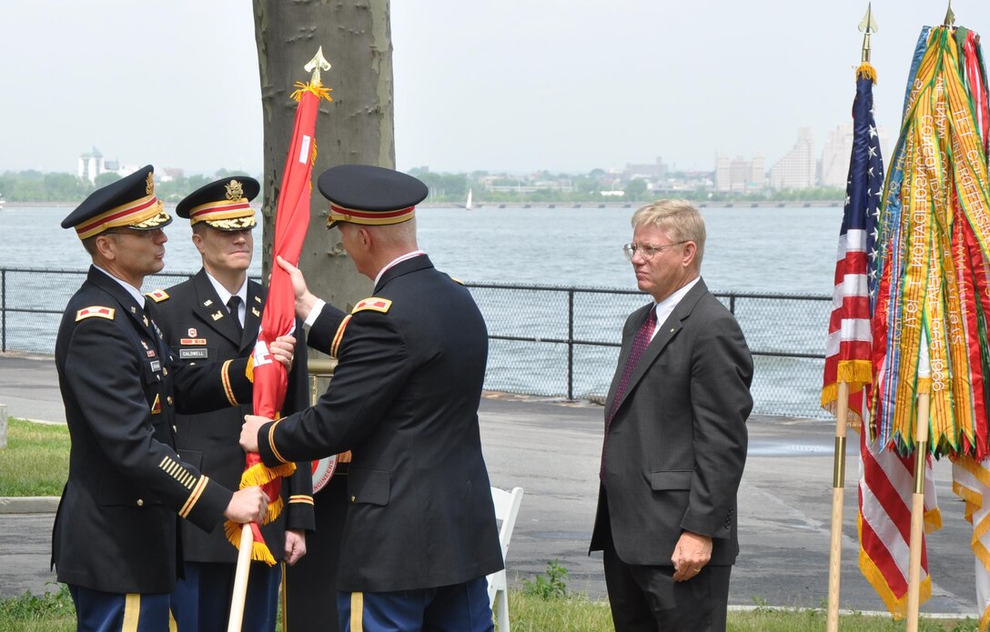 Change of command ceremonies have been carried out for centuries. It is a military tradition steeped in heraldry and its purpose is to emphasize the continuity of leadership and unit identity despite changes in individual authority.                  
(l-r) Col. William Graham, Change of Command Presiding Officer, Commander, North Atlantic Division; Col. Caldwell, (incoming Commander); Col. Paul Owen, (outgoing Commander); and Mr. Joseph Seebode, Deputy District Engineer for Programs and Project Management.
