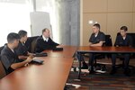 Army Maj. Gen. William Enyart, adjutant general of the Illinois National Guard, talks with cadets from the Illinois Army National Guard at West Point on Feb. 16, 2011.