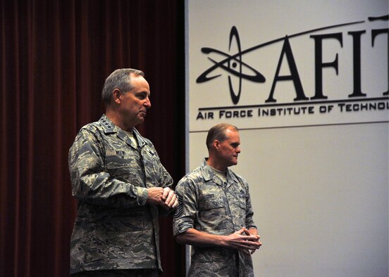 Air Force Chief of Staff Gen. Mark A. Welsh III accompanied by Chief Master Sgt. of the Air Force James A. Cody addressed an assembly of personnel during an all call held at the Air Force Institute of Technology on Wright Patterson Air Force Base, Ohio, June 8, 2015. (U.S. Air Force photo/Mike Libecap) 